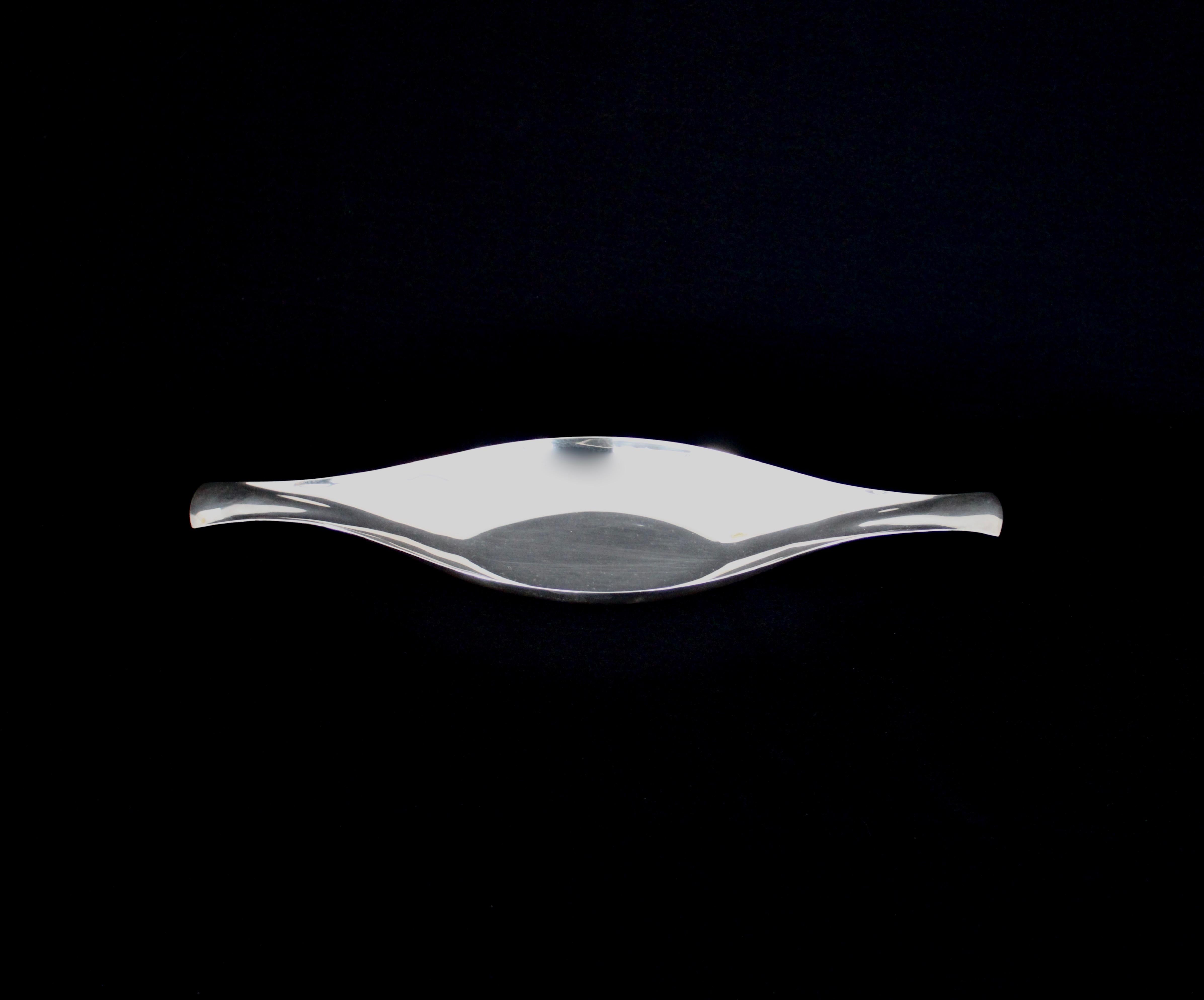 John Prip silver plate elegant modern dish for Reed and Barton. 
Excellent condition no scratches to the surface. 
John Prip was born in New York of a Danish father and an American mother. As a child, he moved to Denmark with his family, where his