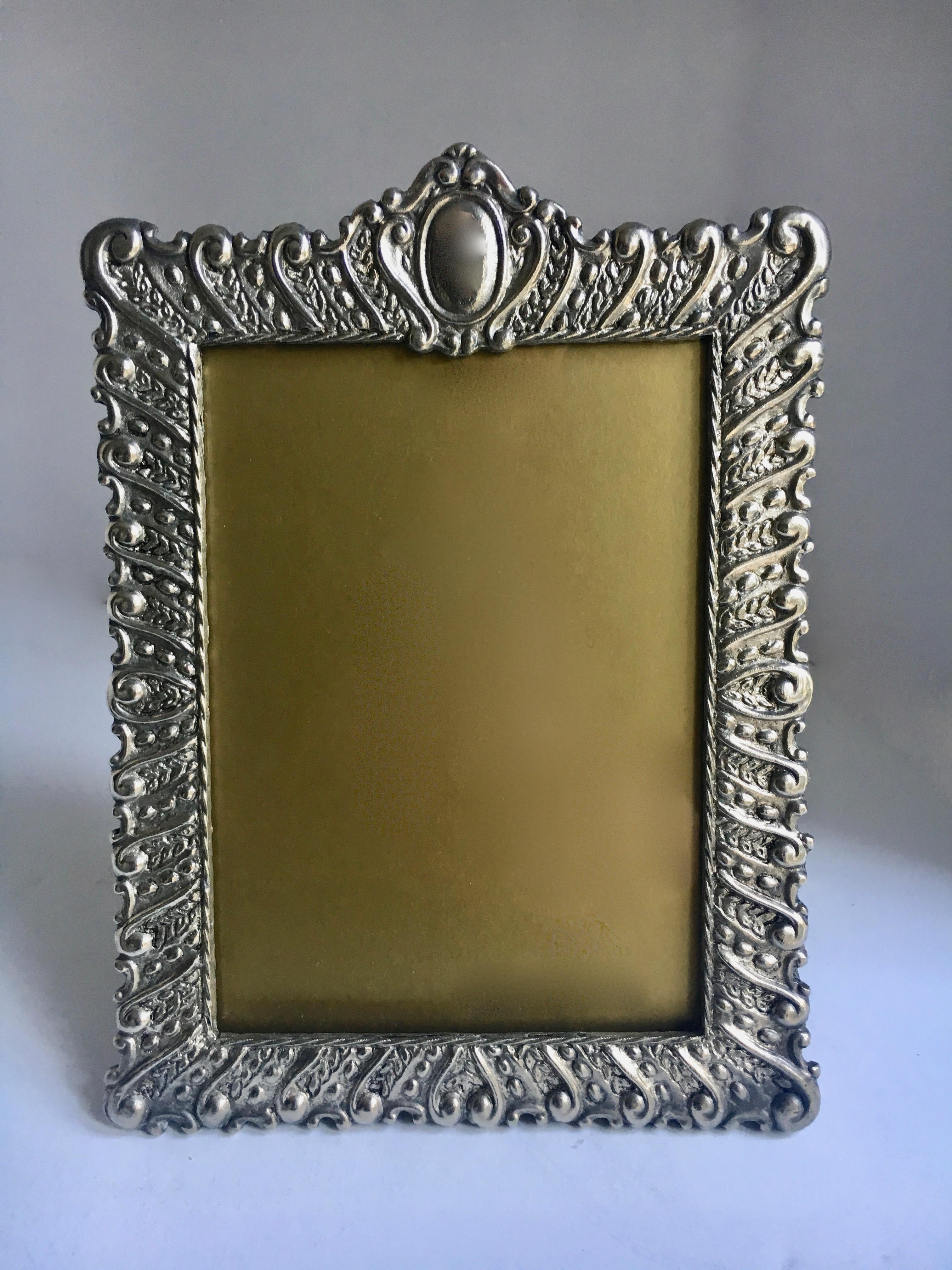 Silver plate 5 x 7 picture frame - a remarkable pattern surround - silver plate.. handsome for a masculine or feminine setting - desk or shelf.
