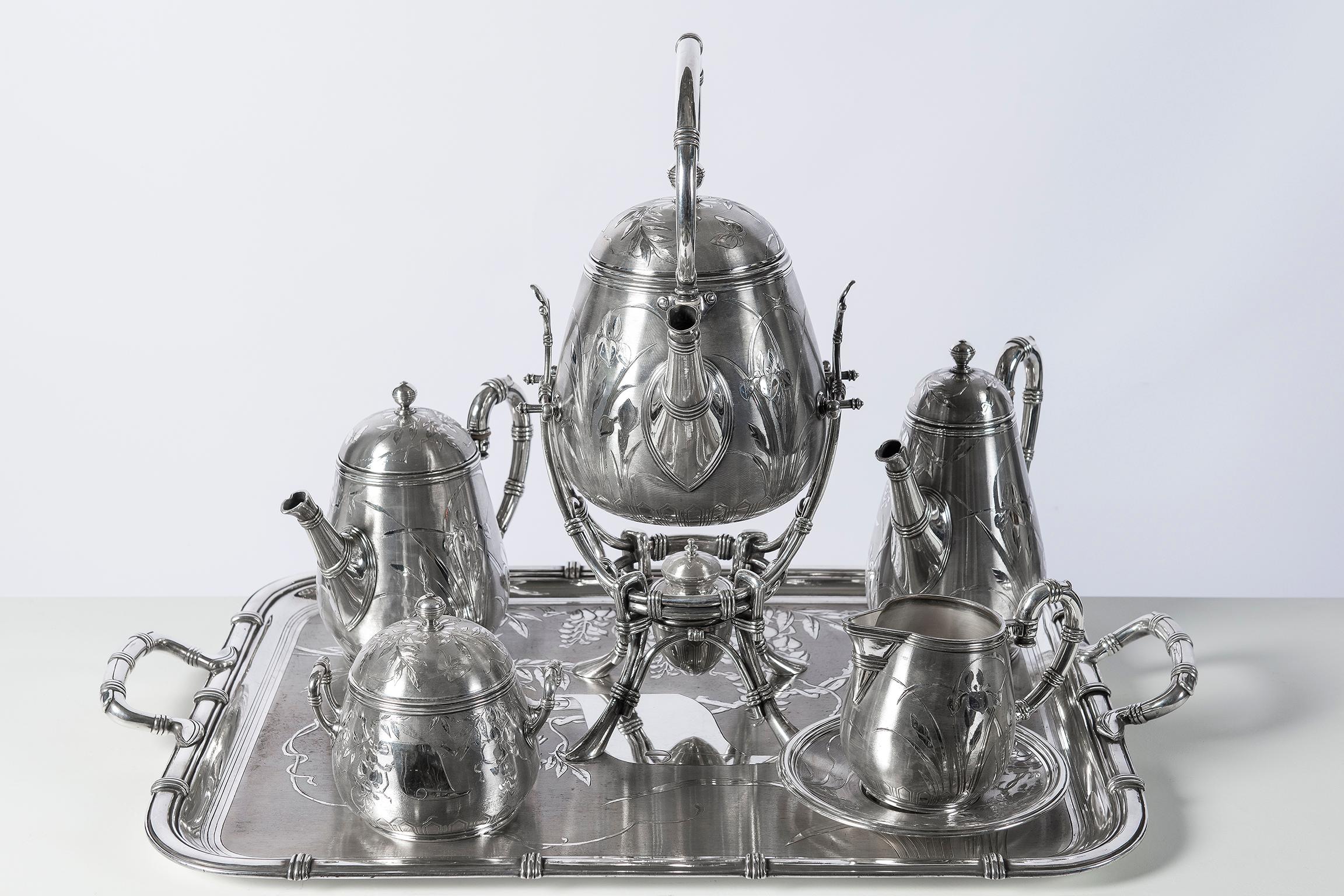 Silver-plate tea and coffee set, bamboo model by Christofle, France, circa 1890.
1 tray, 1 samovar, 1 teapot, 1 coffeepot, 1 sugar bowl and 1 milk jug.
All pieces are signed.
