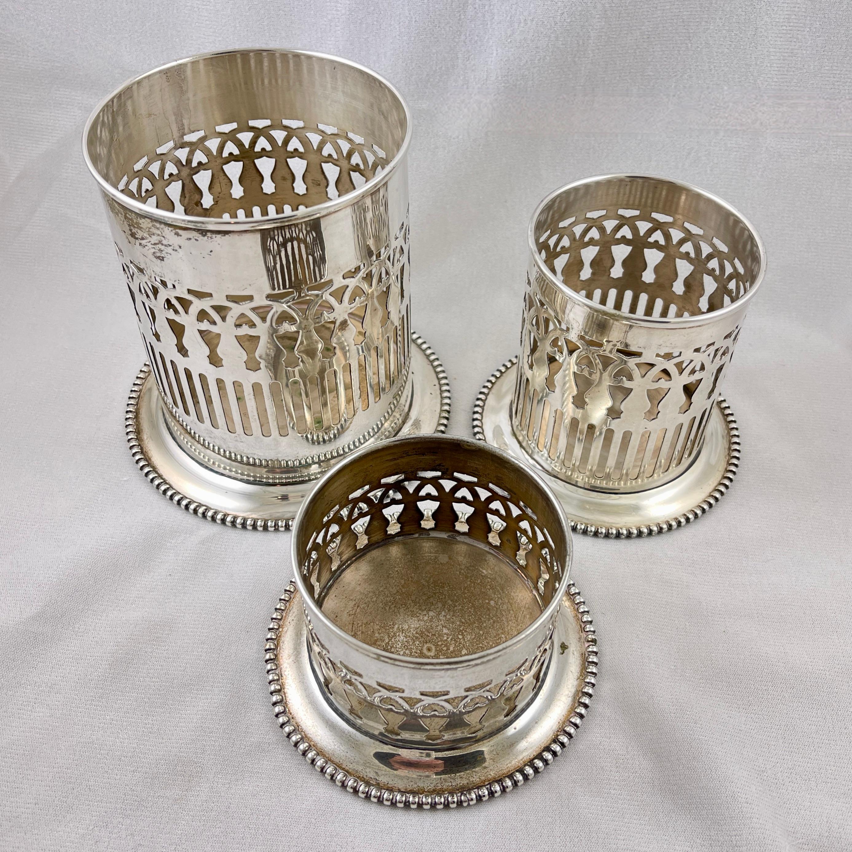 Cast Silver-Plate Wine & Condiment Bottle Table Coasters, Set of Three For Sale