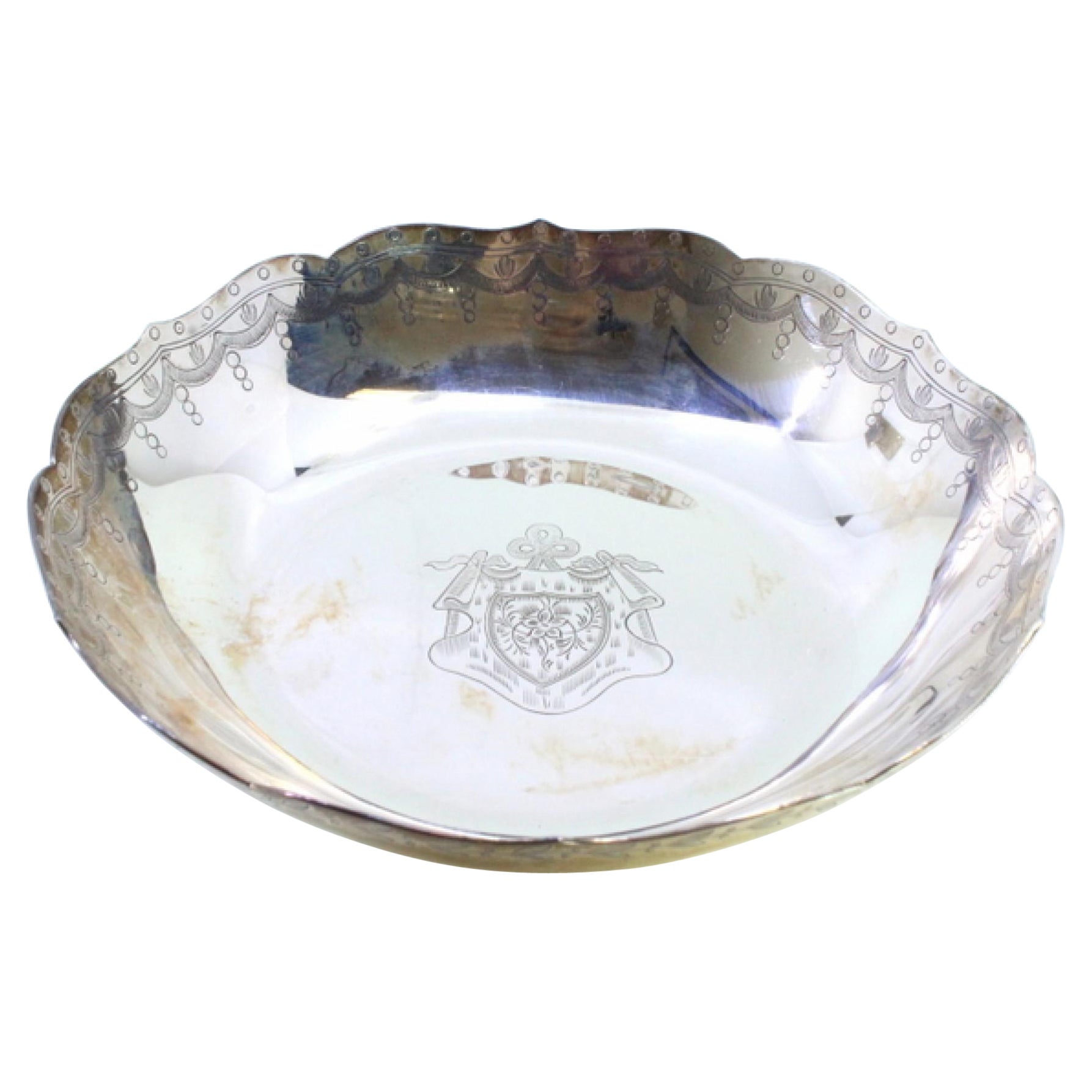 Silver plate with scalloped rim, engraved garlands 
East India Company symbol For Sale