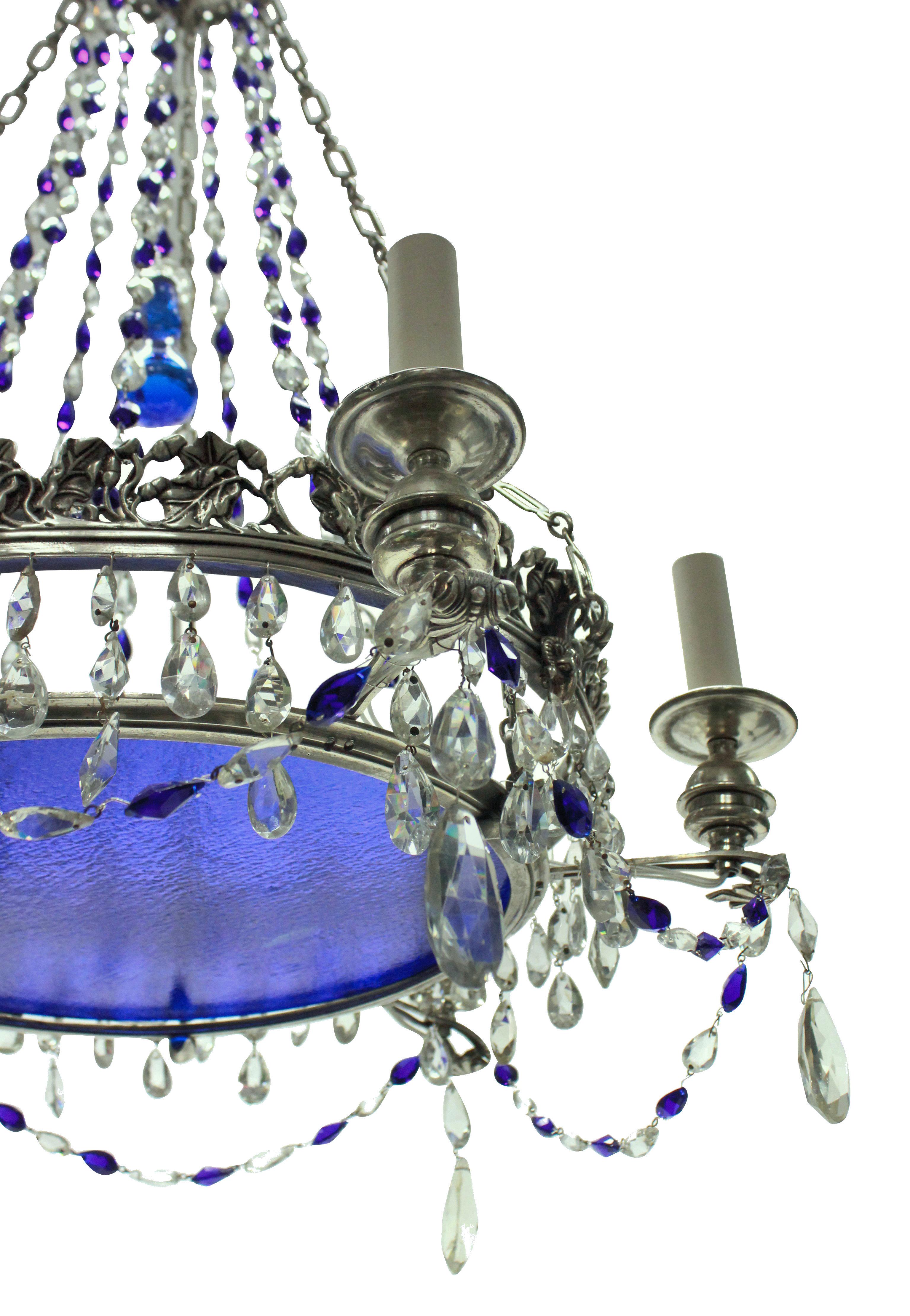 A charming 19th Century Russian chandelier in plated silver with good quality cut glass drops, blue glass details and plate, suspended by silver chain.