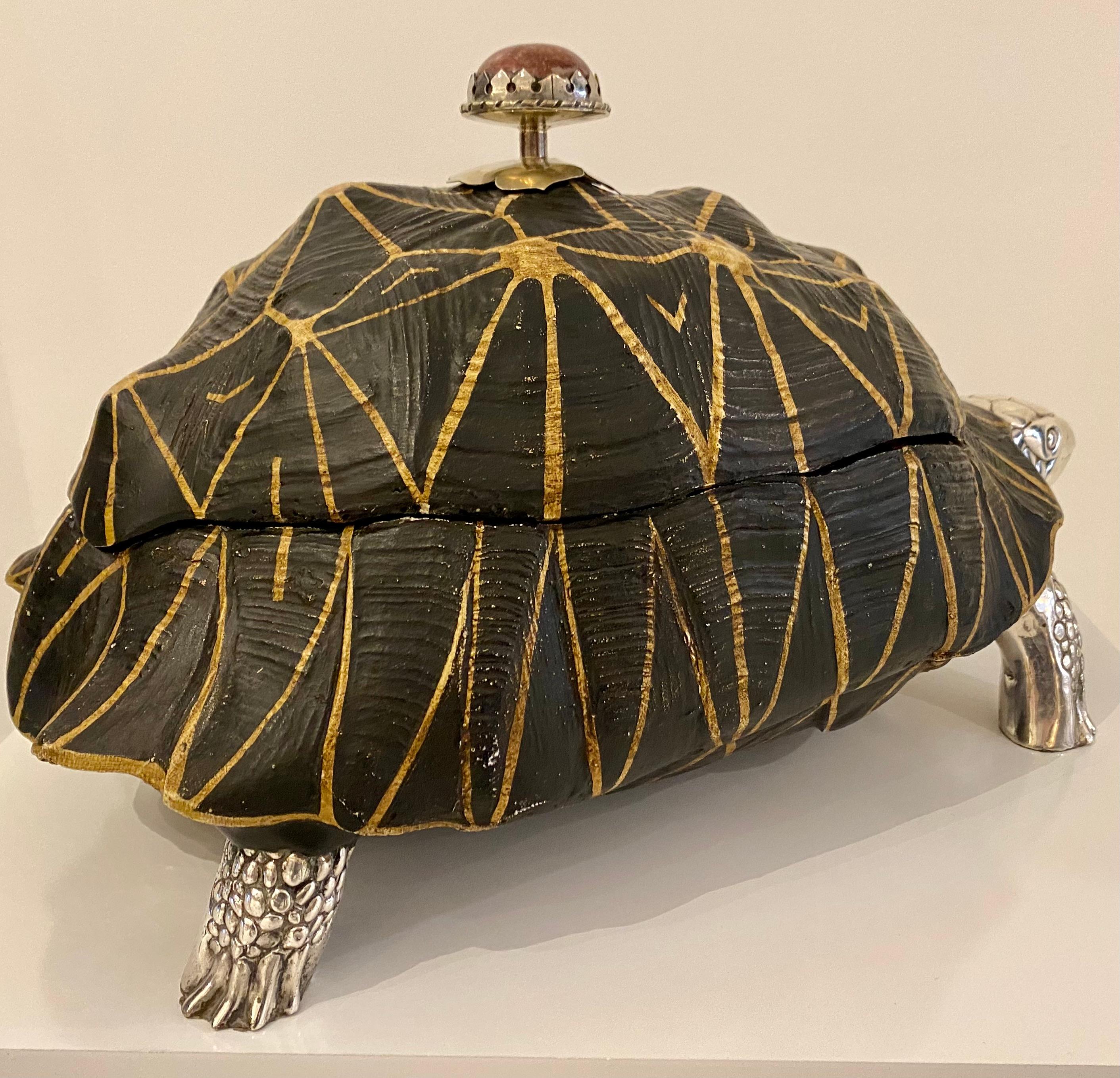This is a rare and unusual cast resin turtle form box by Antony Redmile London. The turtle's head, tail and legs are realistically cast in brass and silver plated for a luxurious finish. The lid consists of a hand painted and embellished resin shell