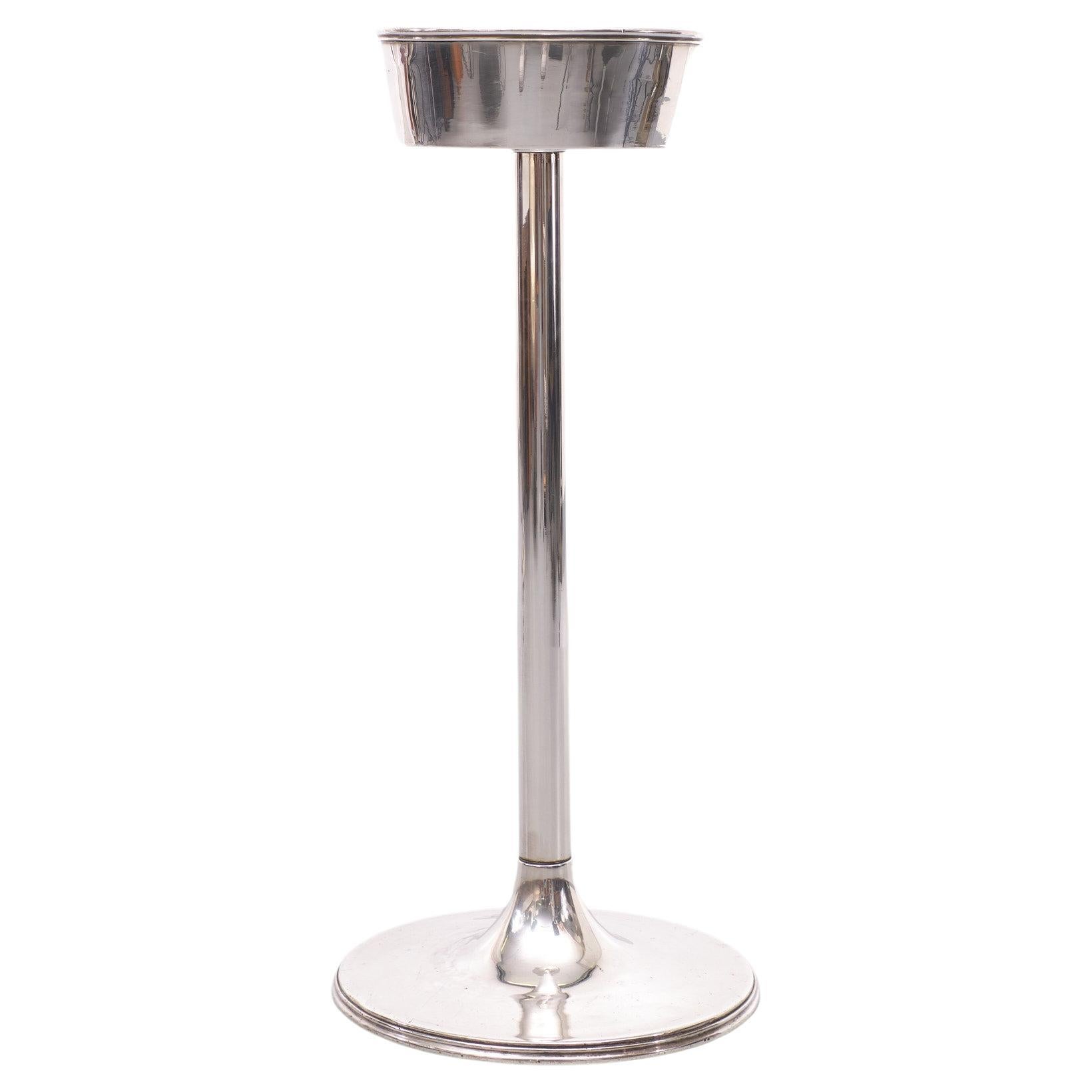 Art Deco Silver Plated Champagne cooler holder . Nice quality 
Oval shape bucket . Normal wear and tear,after 100 years .some dents in the base gives it character . 
