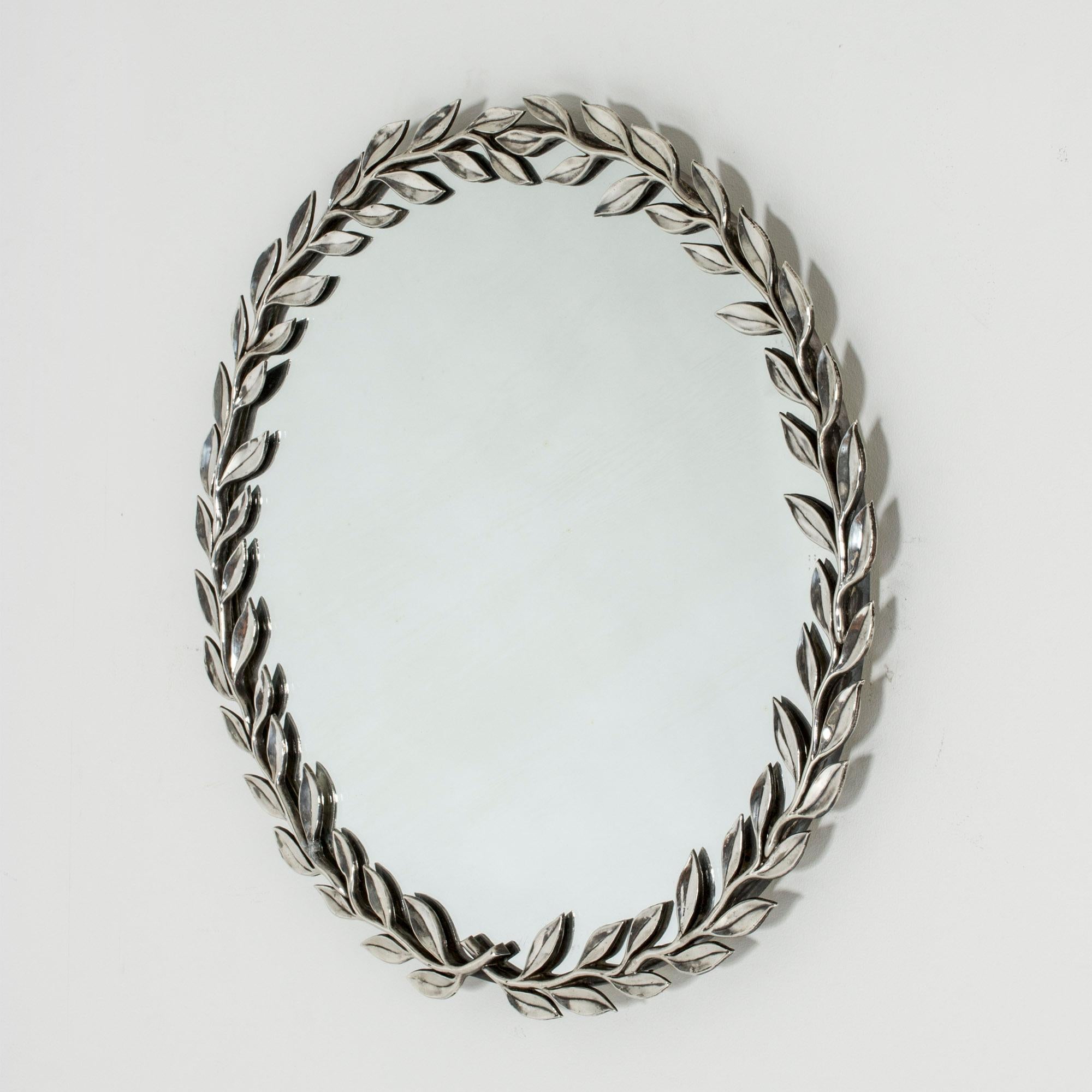 Stunning “Bay Leaf” wall mirror by Estrid Ericson, made from silver plated pewter. Can also be used as a table mirror.