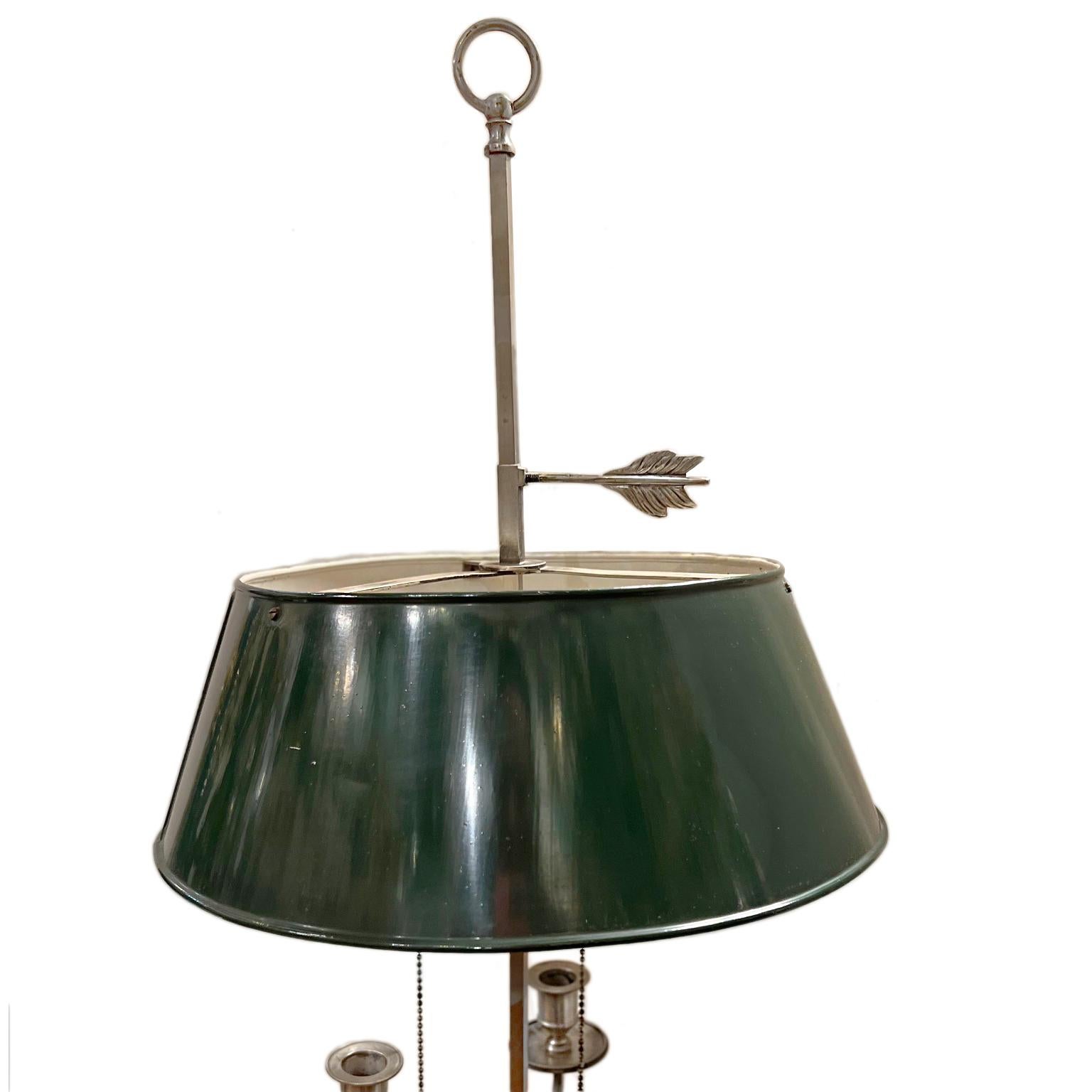 A large French circa 1920's silver plated Bouillotte lamp with tole shade and original patina.

Measurements:
Diameter: 14