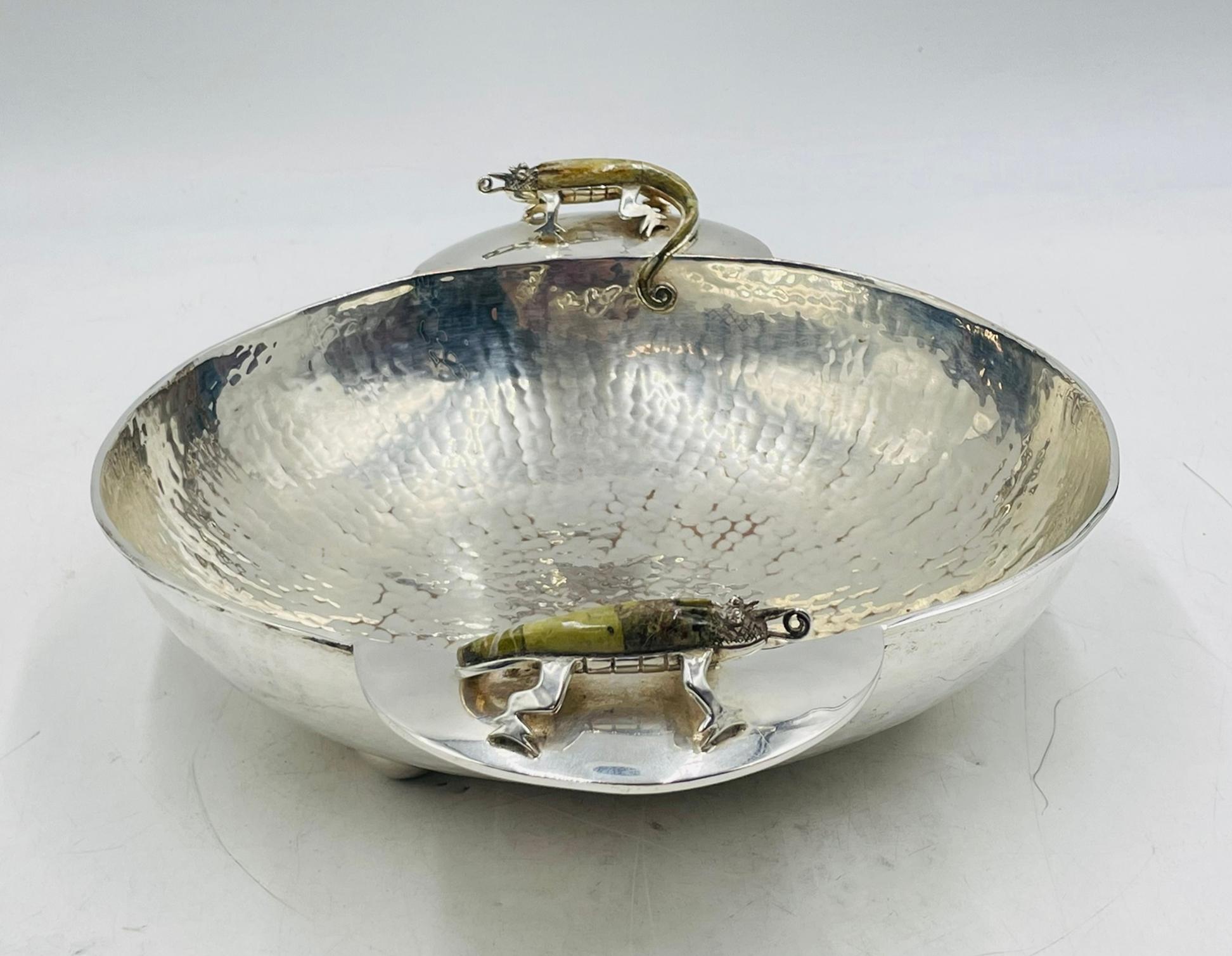 This beautifully crafted silver-plated bowl was designed by Wolmar Castillo Silversmiths for Los Castillo, a well-known Mexican workshop admired for its creative metalwork. The bowl features a hand-hammered texture that gives it a rich, reflective