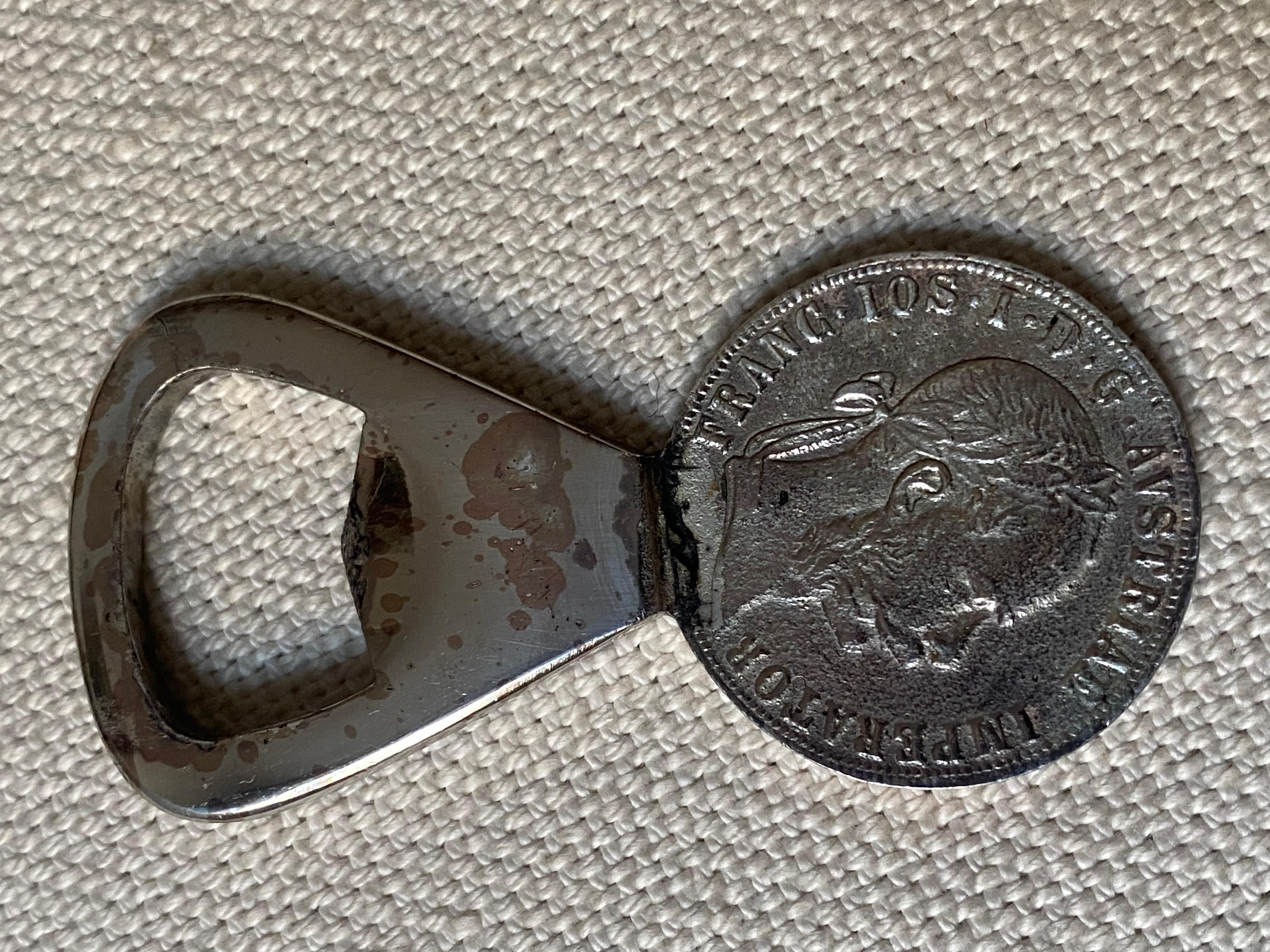 Austrian Silver Plated Brass Coin Bottle Opener by Carl Aubock, circa 1950 For Sale