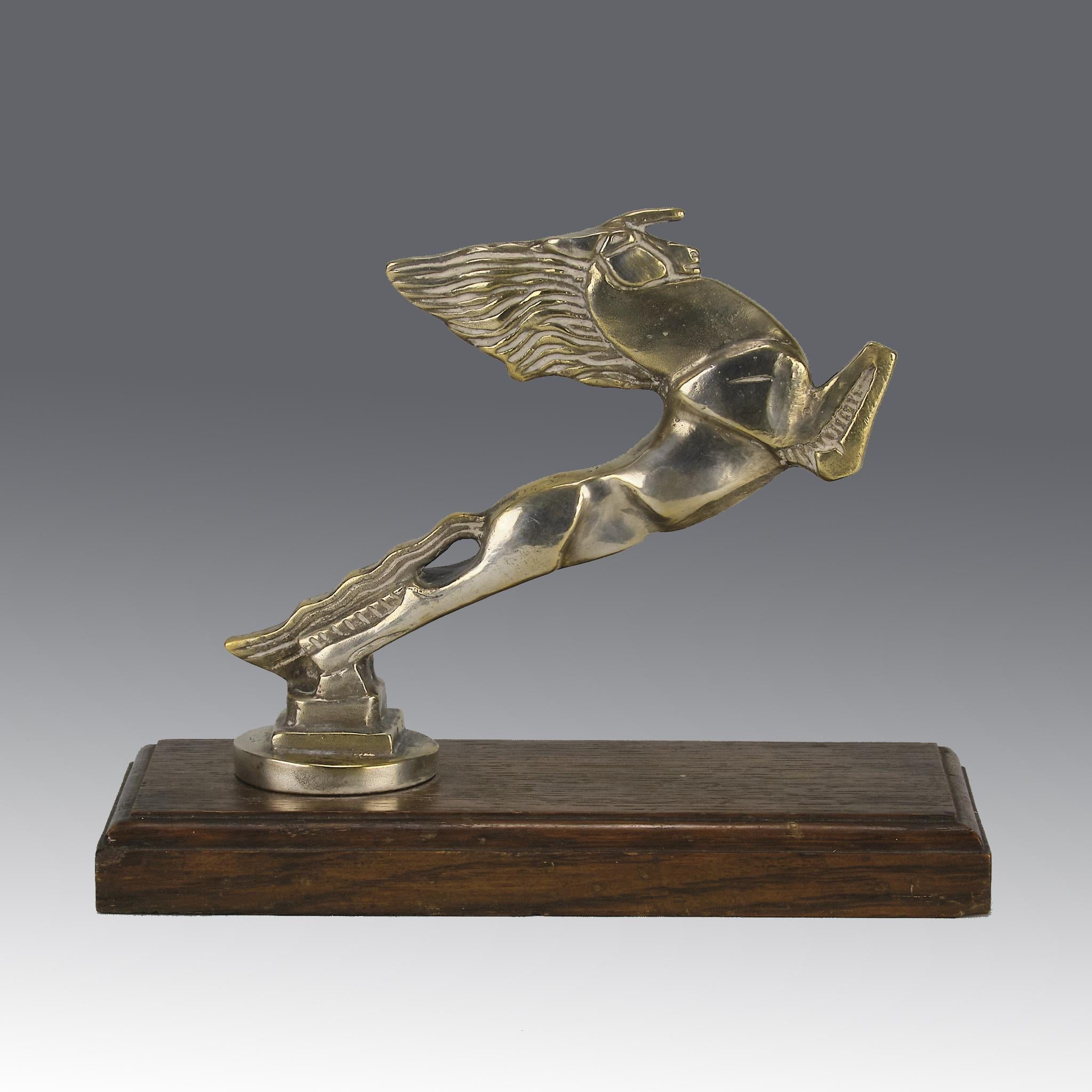 A striking mid 20th Century Art Deco silver plated bronze car mascot in the form of a leaping horse, with fine detail. Raised on a wooden rectangular base, signed Bazin

ADDITIONAL INFORMATION
Height: 18 cm 

Width: 16 cm

Depth: 10