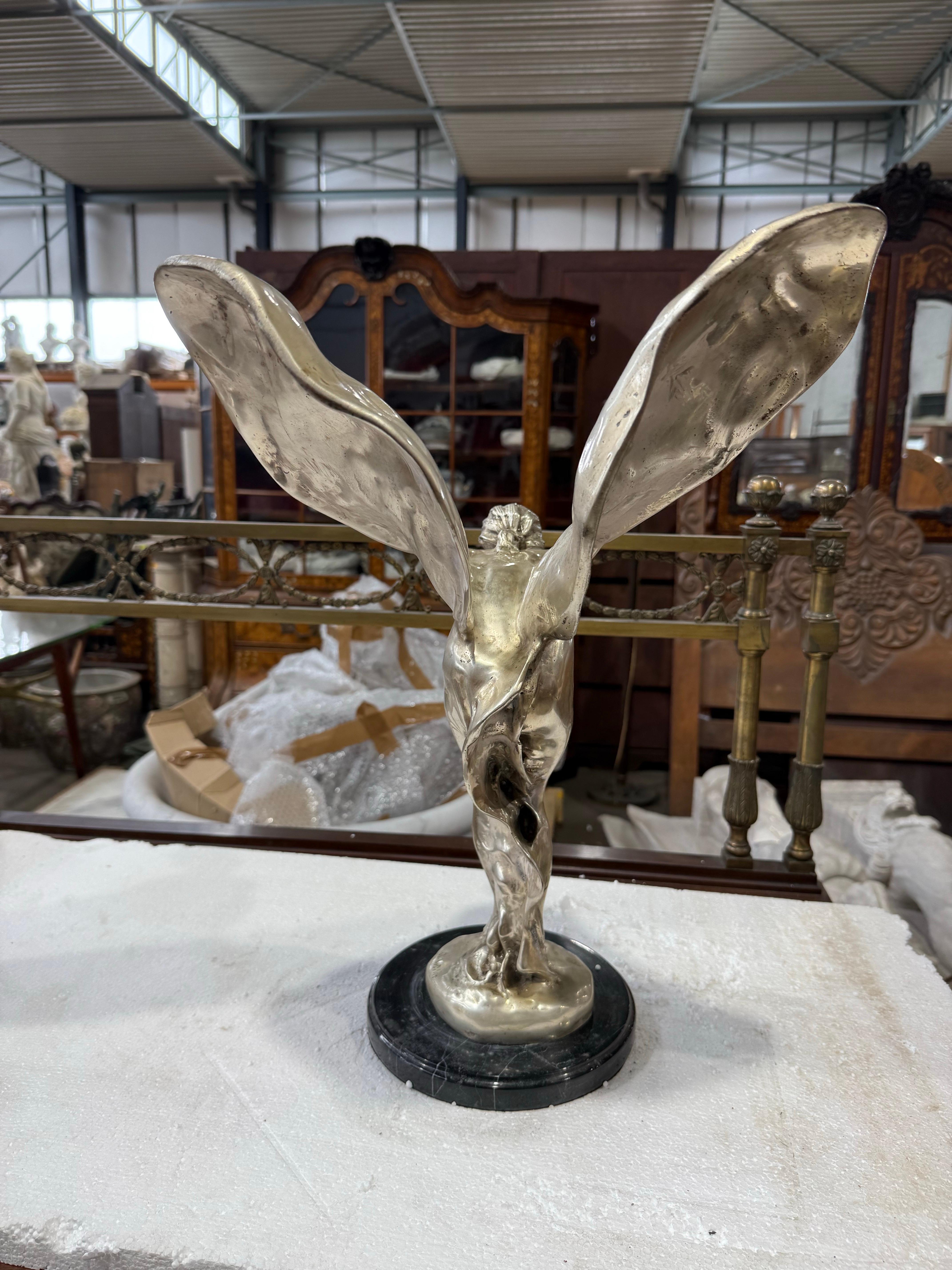 Scultura in bronzo placcato argento 