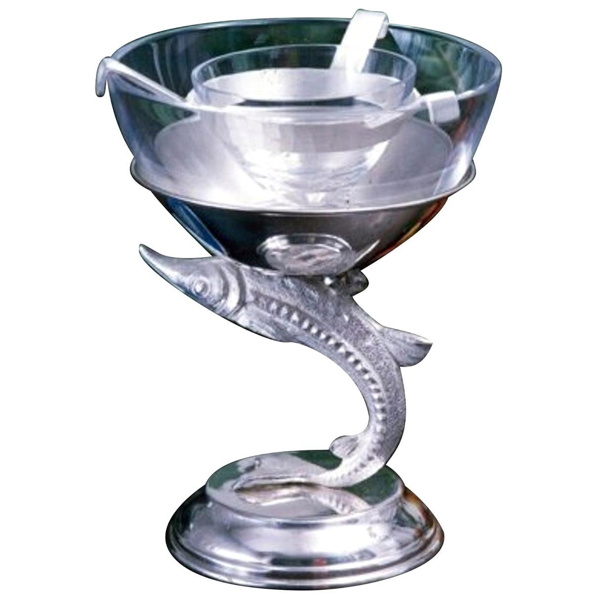 This stunning silver and glass caviar server is the ultimate way to serve your guests caviar. A small glass bowl is suspended within a larger glass bowl thanks to a metal holder, while both pieces rest on a silver structure in the shape of a small