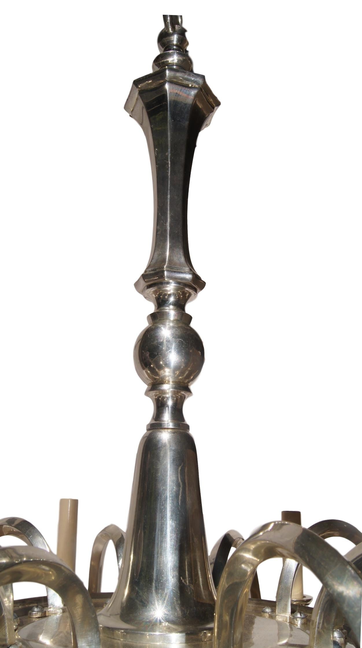 A circa 1920s English silver plated ten-arm chandelier.

Measurements:
Minimum drop: 28