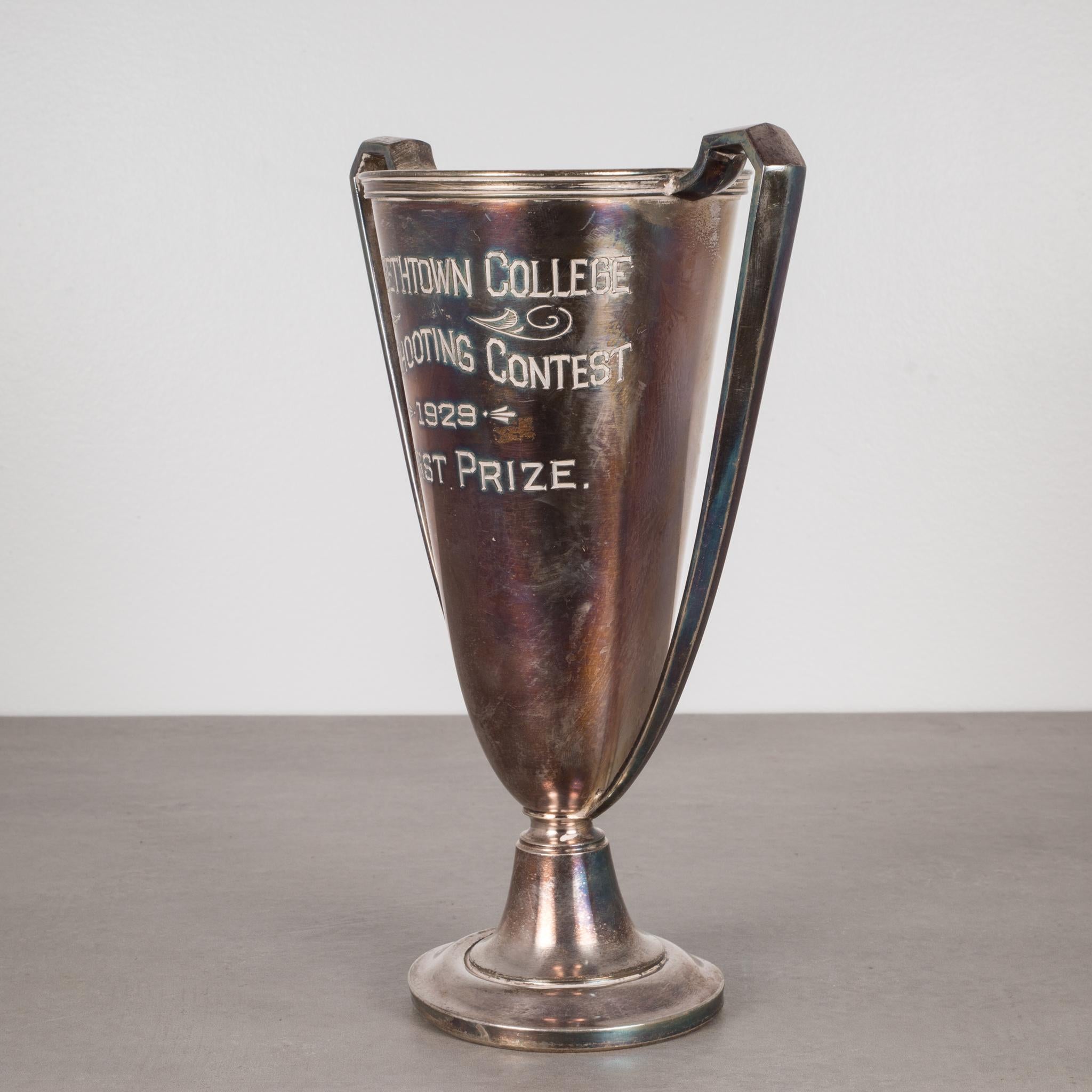 Silver plated loving cup trophy with the inscription:
