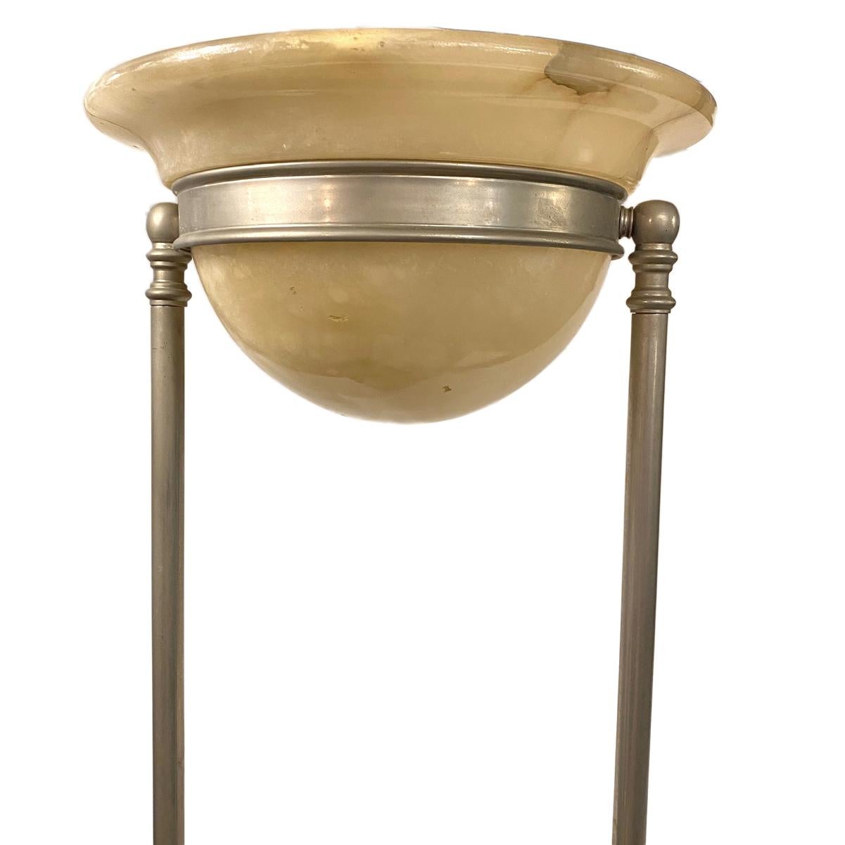 A circa 1950s Italian silver plated floor lamp with a swiveling alabaster bowl top.

Measurements:
Height 70.25