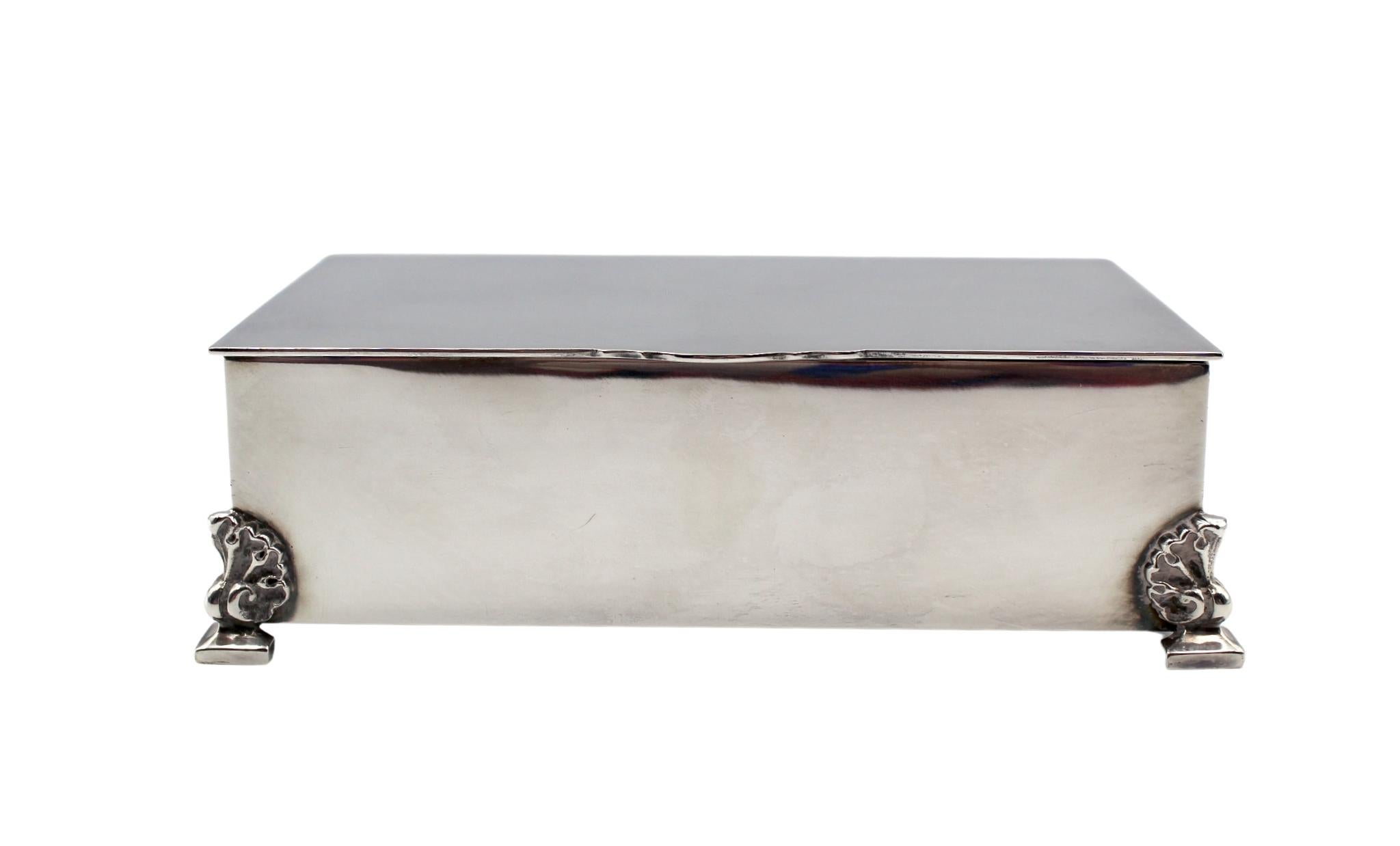 Offered is a silver plated keepsake box, dating to the early 1900s. The hallmarked box offers great storage solution for jewelry, cufflinks, and other keepsakes, with a divided interior. A well maintained, elegant piece, this antique silver box is