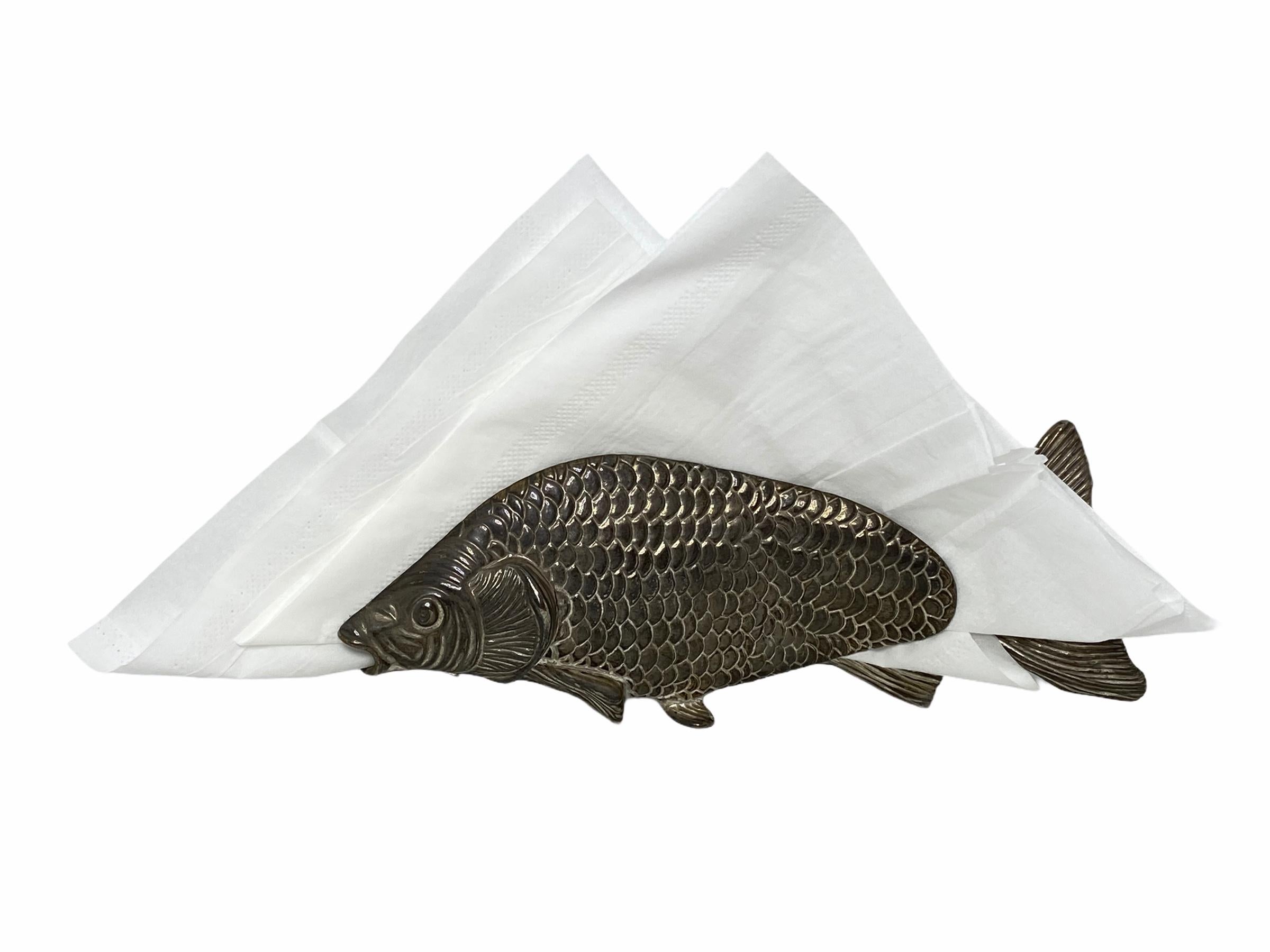 A silver plated figural napkin rack / stand in the form of a carp fish, circa 1960s, Germany. Nice addition to every table or hunting lodge. Some patina, but this is old-age.
 