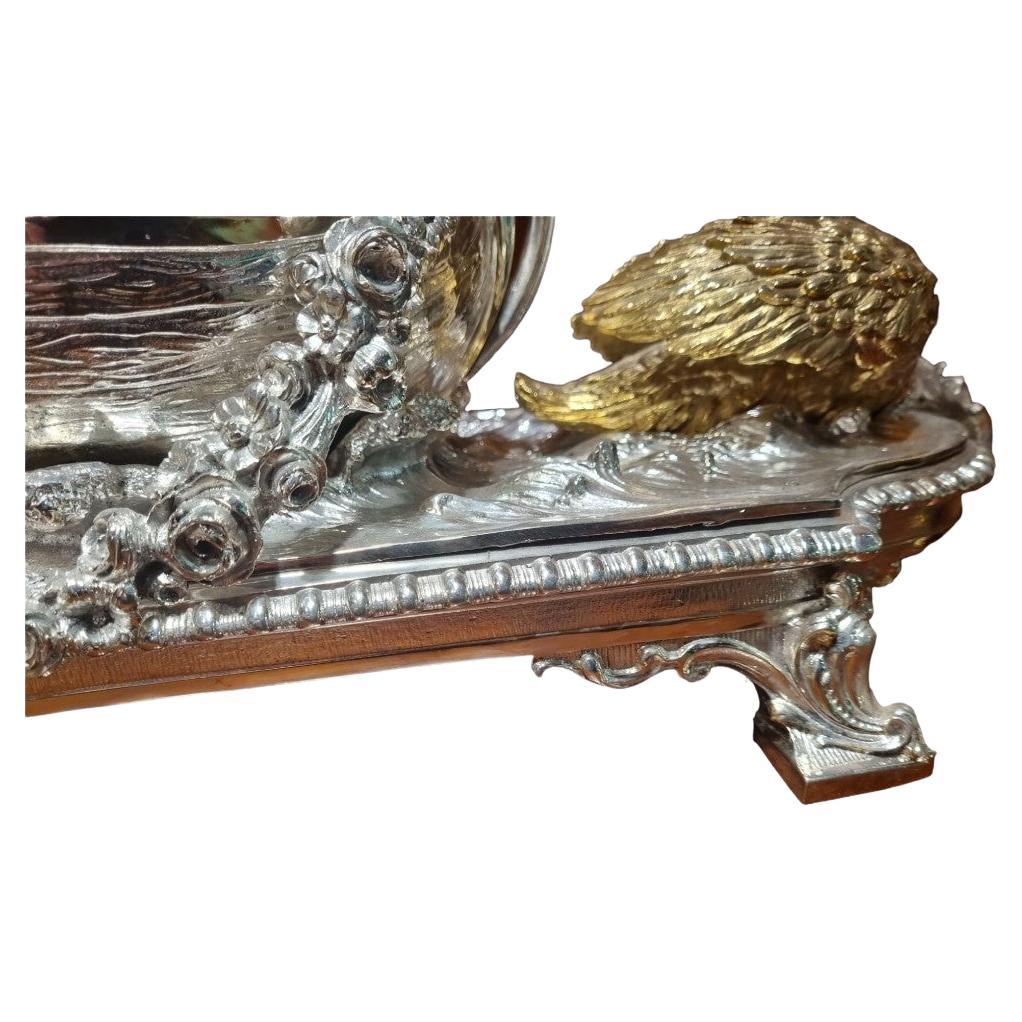 A Very Fine Silver Plated Centrepiece
This Centrepiece is extremely Well Modelled consisting of a Boat and Cherub at the Helm
Dates C20th.