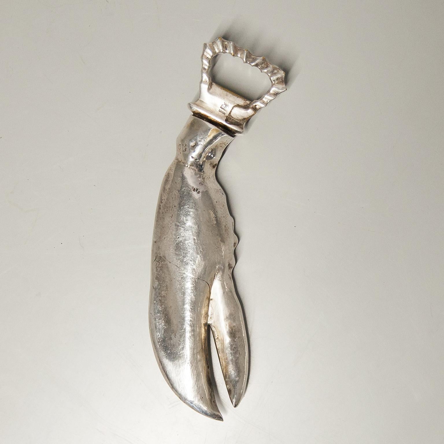 Wonderful silver plate lobster bottle opener designed like a sculpture, made in Spain in the 1970s.
