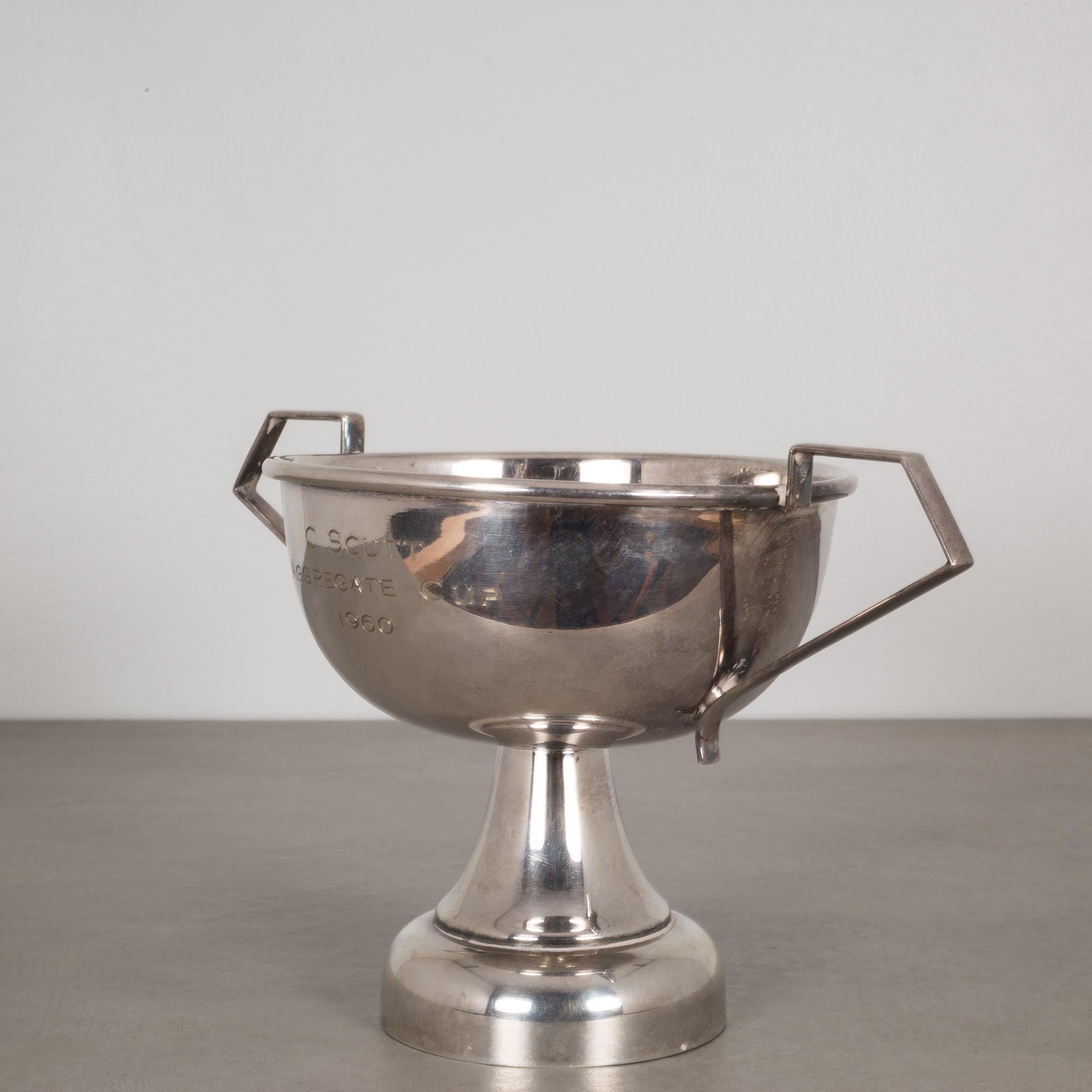 About

This is an original silver plated loving cup trophy monogrammed 