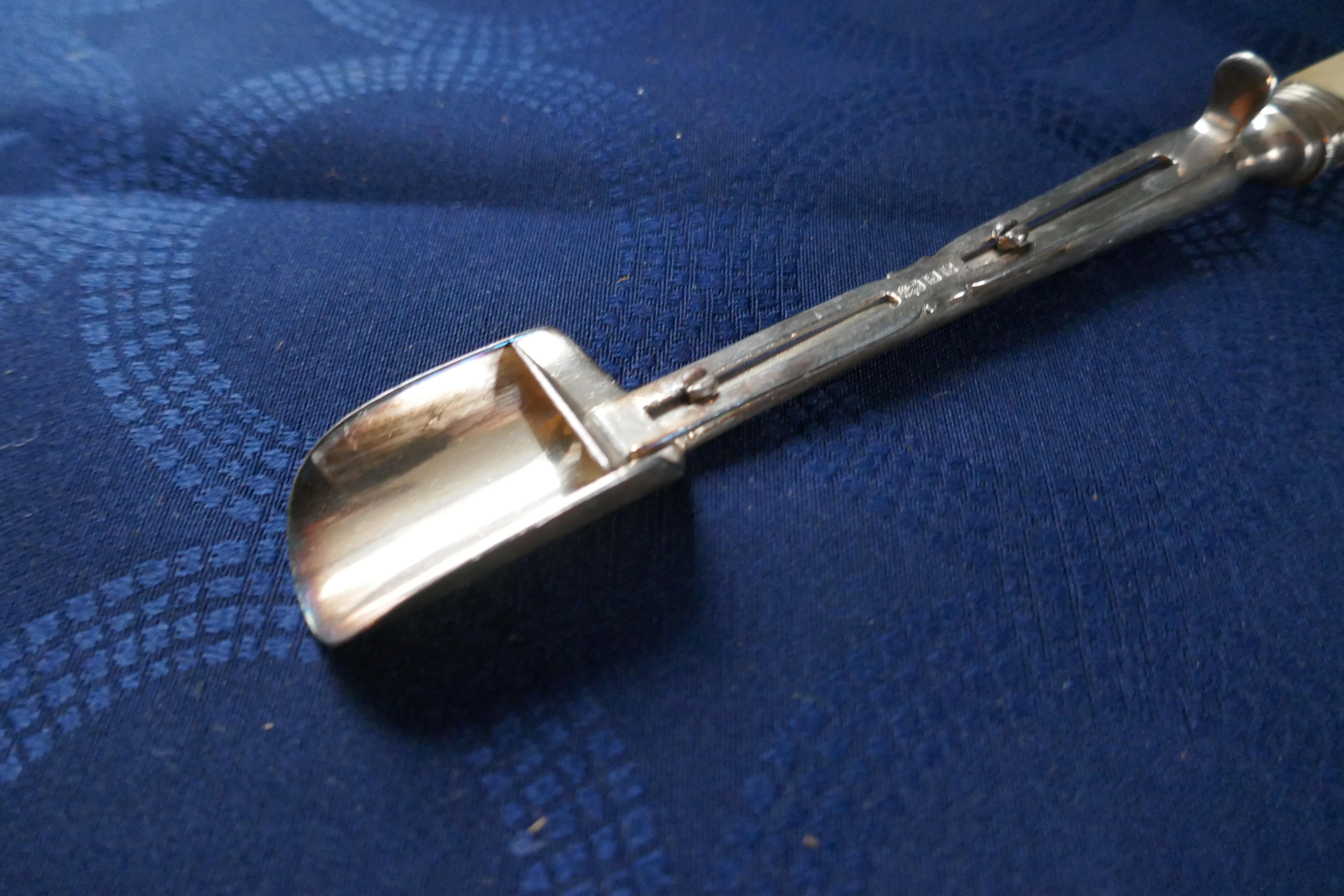 Silver plated mechanical stilton cheese scoopmade by Brad Food

This rare piece dates back to the 1930s, a lovely pice with little signs of wear, a necessary piece for any cheese gourmand 
The scoop is 10” in length
EB37.
  