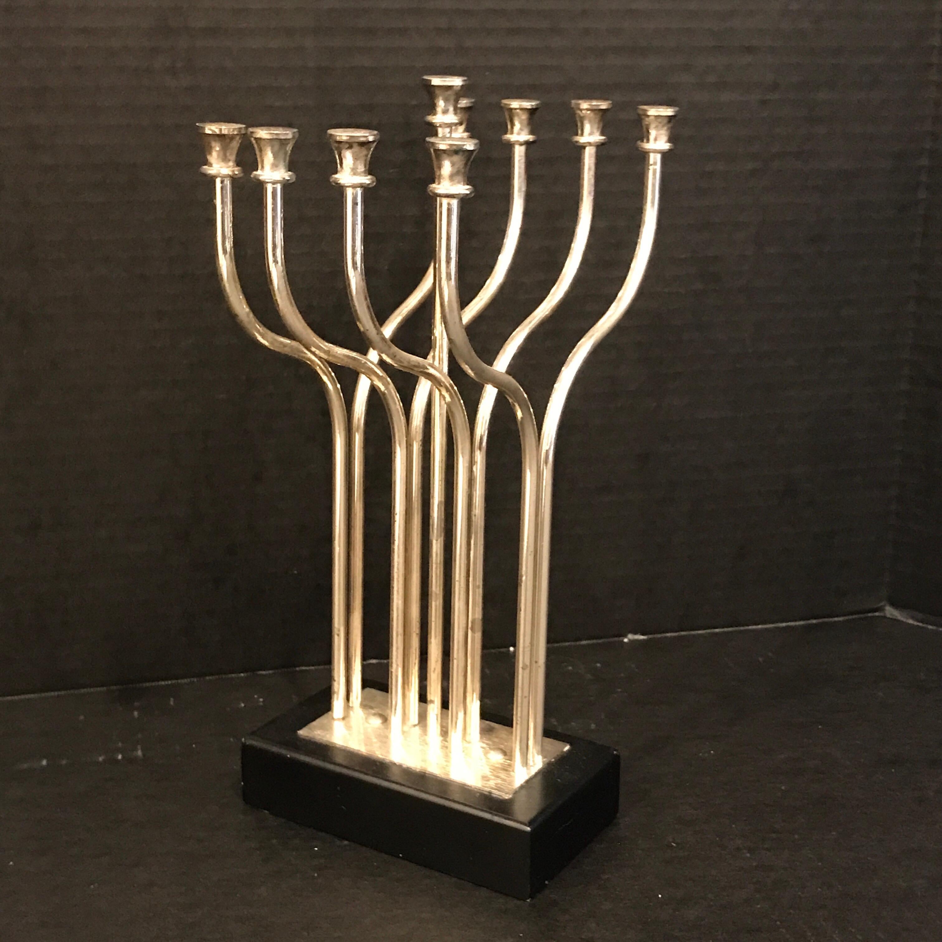 Silver plated Menorah in the style of Yaacov Agam, engraved in script 