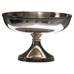 Ciotola con piedistallo in metallo argentato