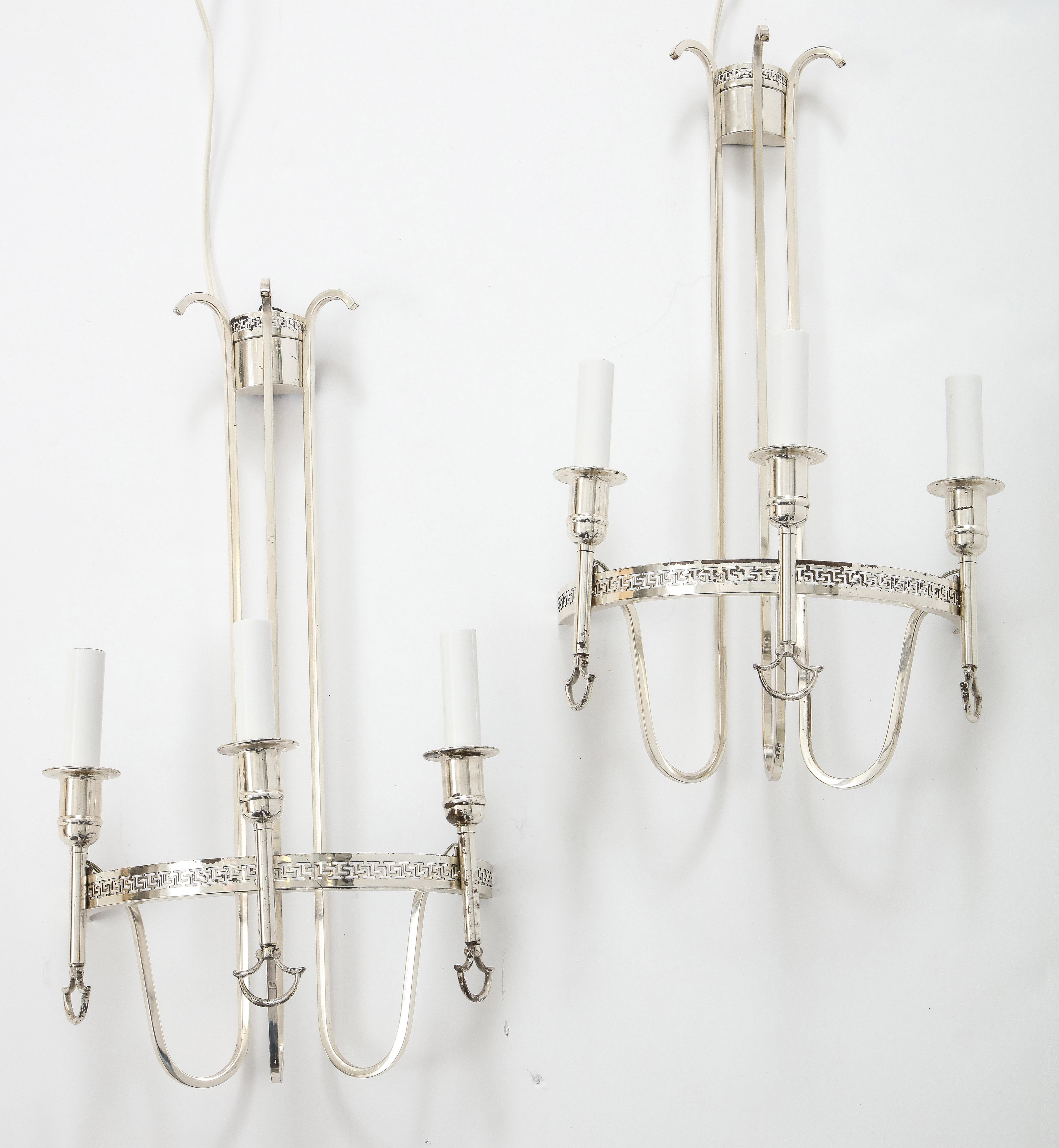 Silver plated neoclassic chandelier and pair of wall sconces 

Measure: Sconces 21