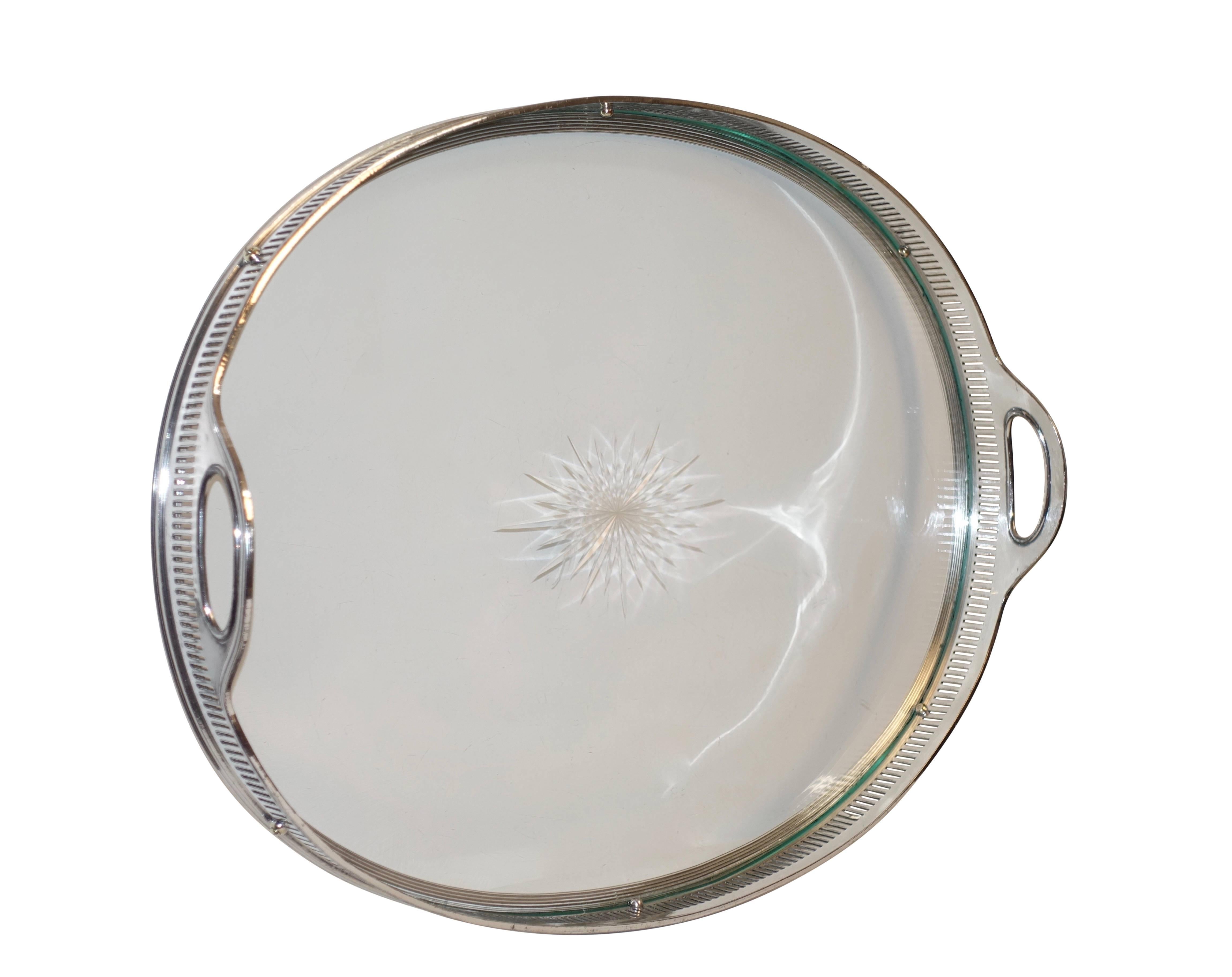 A Meridian silver plate oval shape tray with cut-glass bottom, American, mid-20th century.