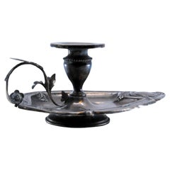 Silver plated paddle with triangular base