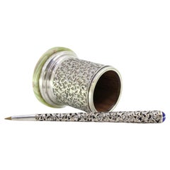 Silver-plated pen holder with floral motifs, wooden interior