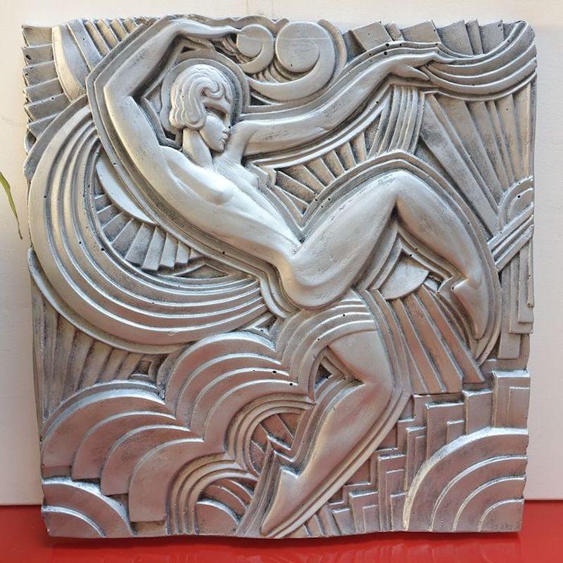 Silver plated plaster bas-relief remake of one Maurice Picaud, known as “Pico”, (1900-1977)
“La danse” or “serpentine dancer”, based on the façade of the “Folies Bergères.”

Faithful reproduction in good condition. Presence of a small slit in the