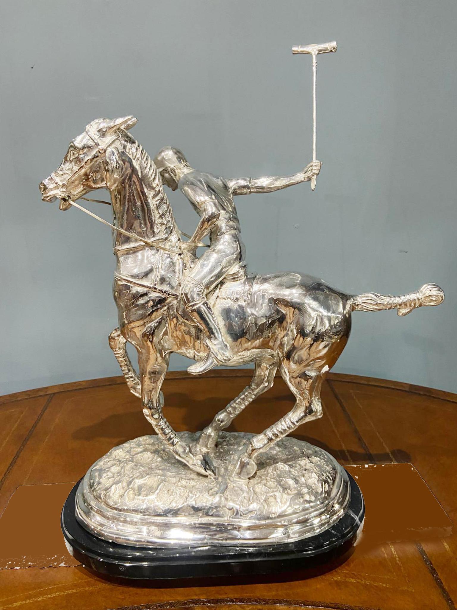 Stunning English bronze casting of a polo player in full swing which has been finished in silver plate
Artist has really captured the energy and athleticism of the scene with great skill
Patina to the silver plate is great, very bright and