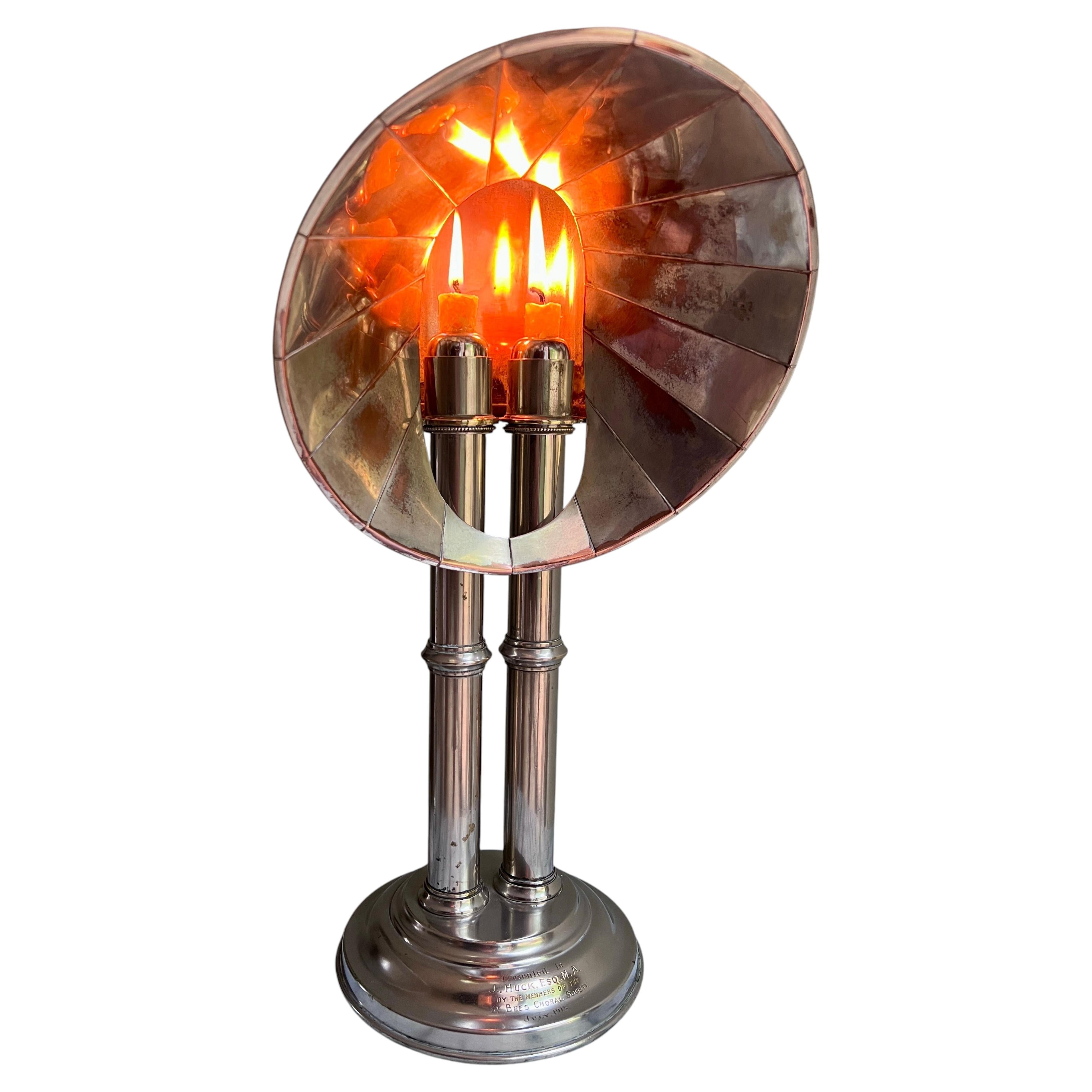 Lampada a candela con riflettore placcata in argento, iscritta e datata 1913