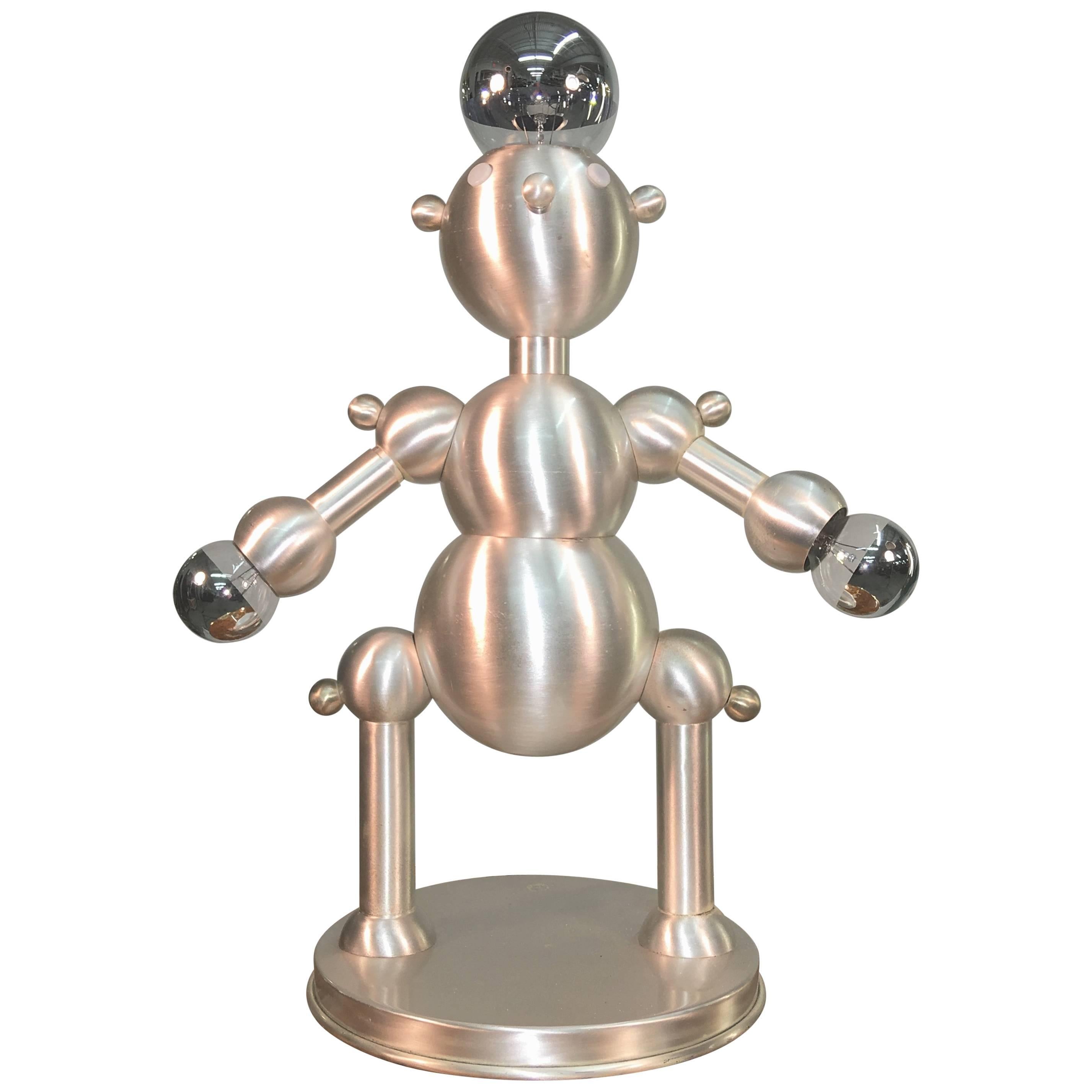 Lampe robot en métal argenté