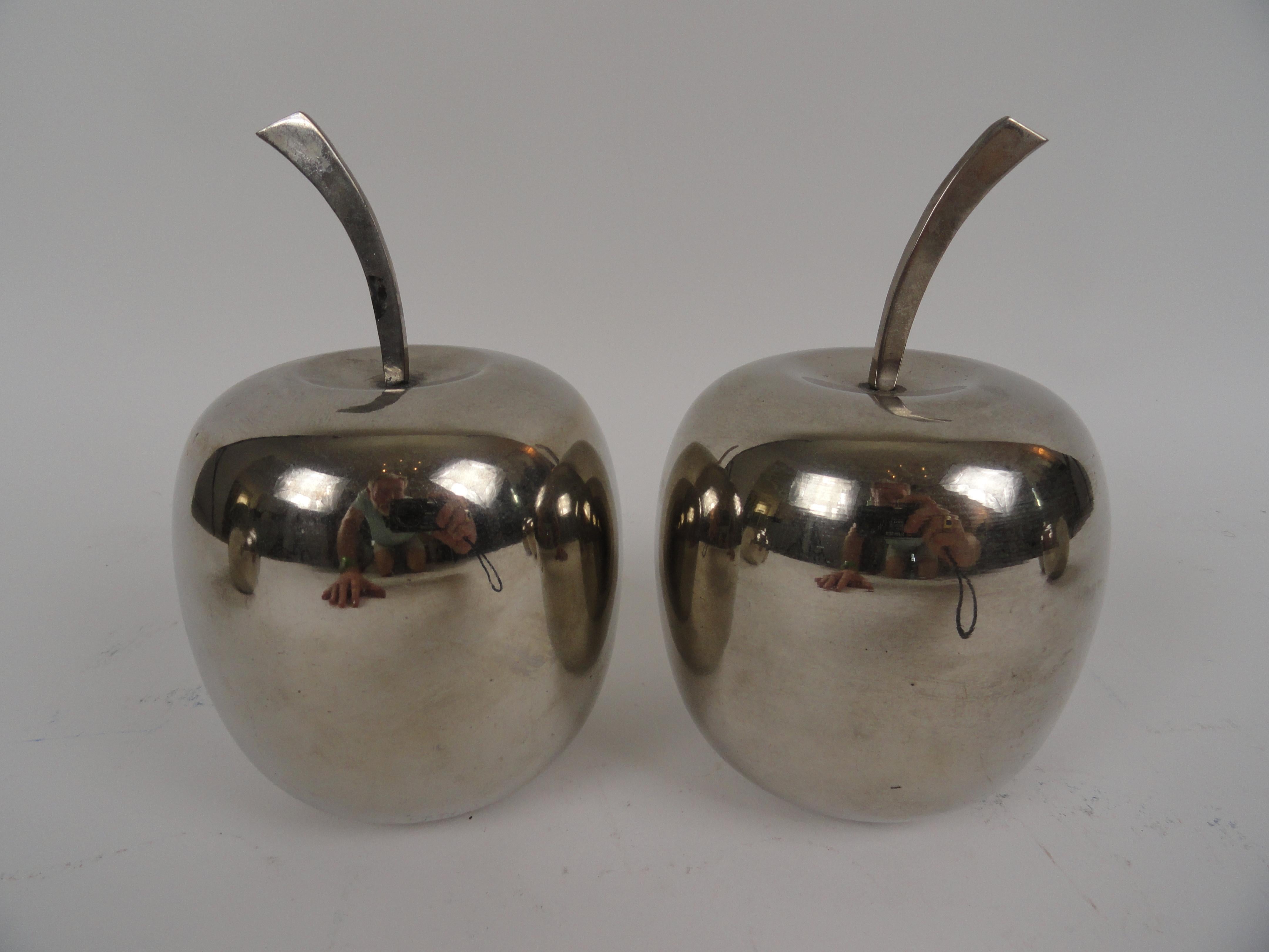 Six-piece collection of silver plated sculpture fruit. Two pears and four apples, all with stems.