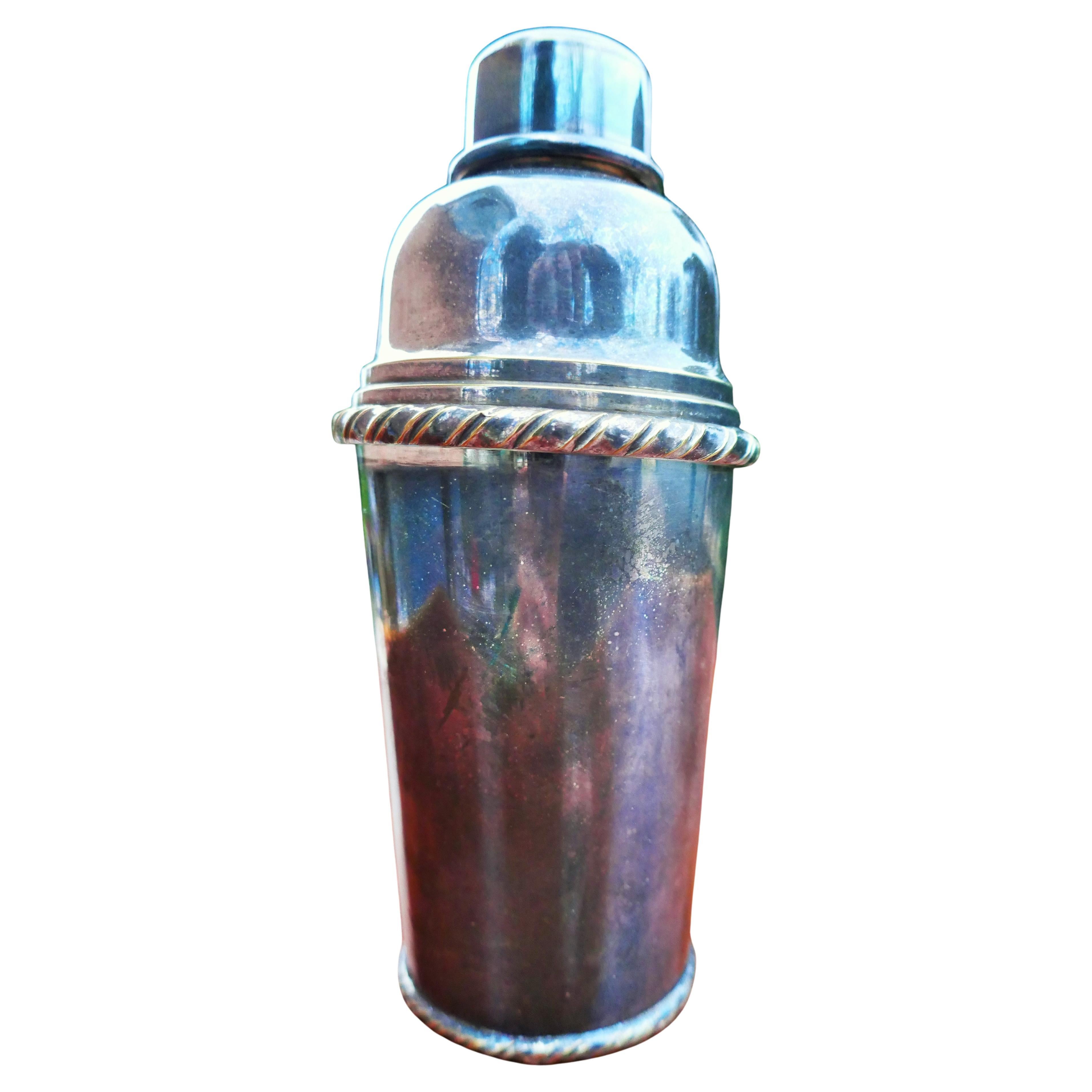 Coctelera plateada, cubitera y pinzas para hielo en venta 3