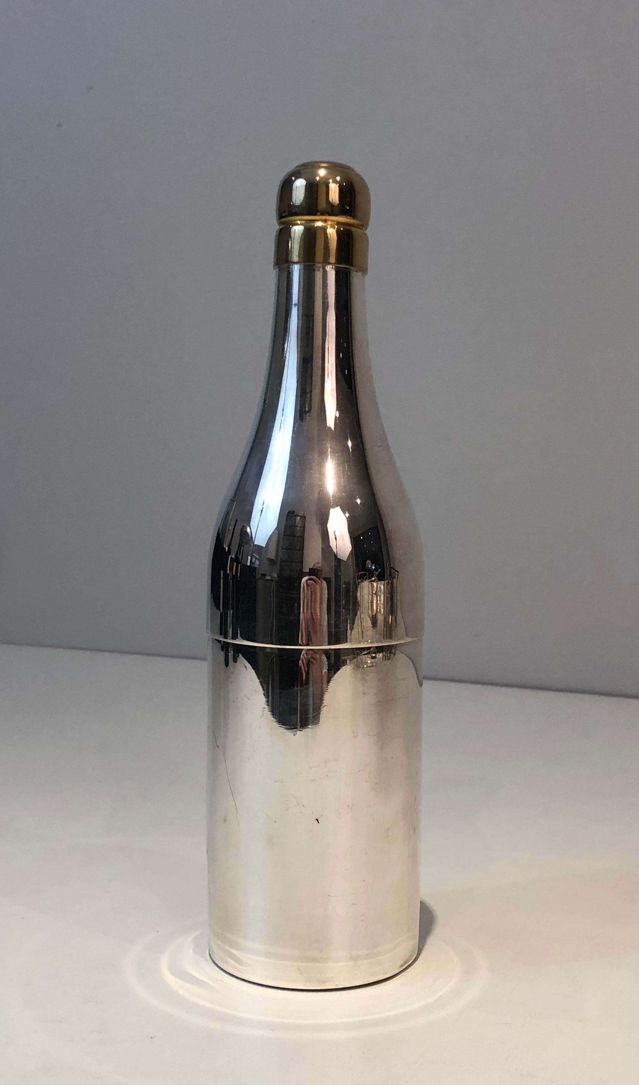 This rare silver plated shaker is presenting a Champagne bottle. This is a French work, circa 1930.