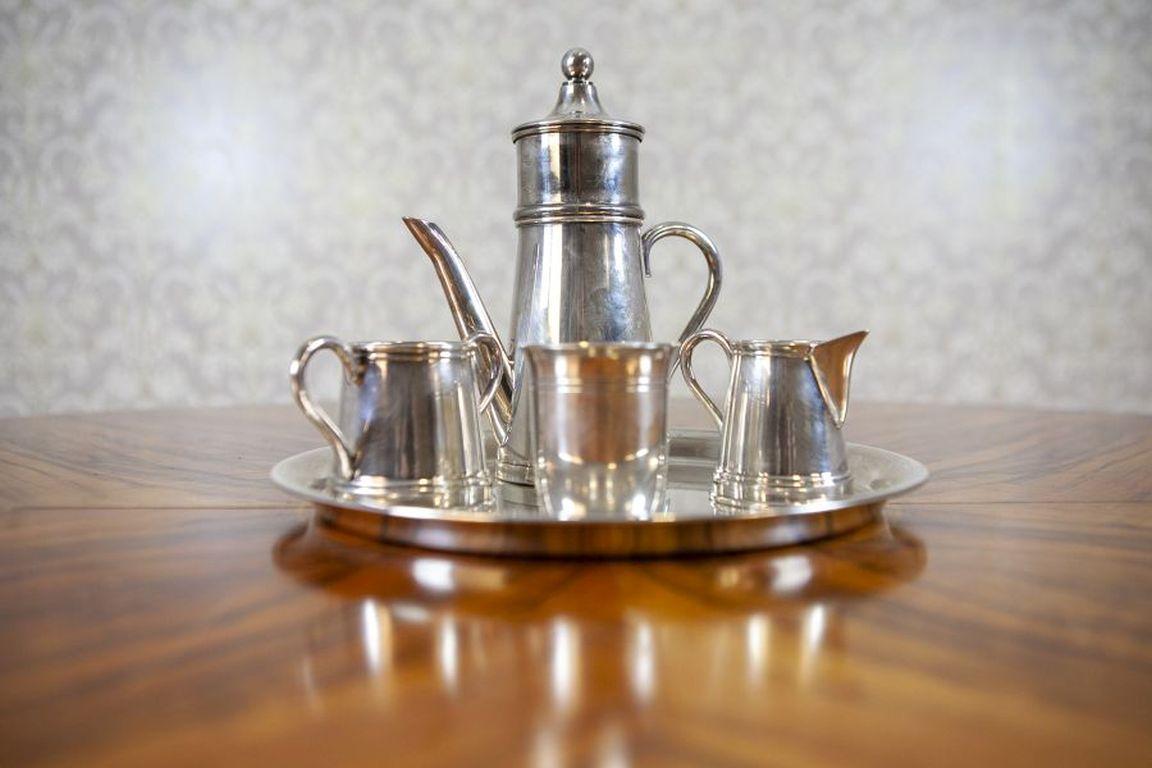 Silver Plated Coffee Set From the Turn of the Centuries With Tray - SOLA

Silver plated coffee set with tray, consisting of four pieces - manufacturer SOLA. The set is in particularly good condition.
Dimensions of items:
Pitcher: high of 23 cm,