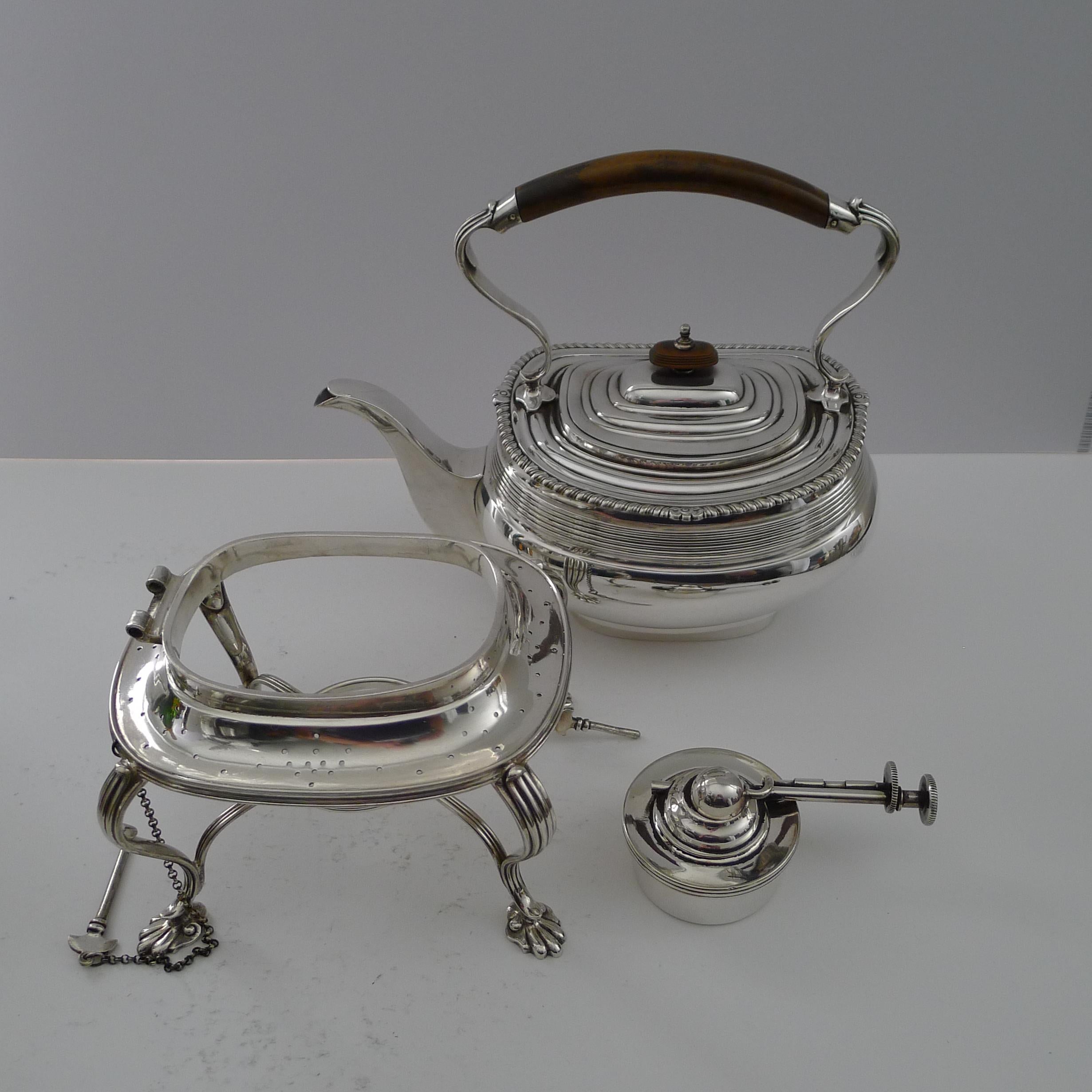 A stunning example of a top quality silver plated spirit kettle and stand made by the top-notch silversmith, Mappin & Webb.  The underside of the kettle is fully marked and is lucky enough to have an English Design Registration number, dating the