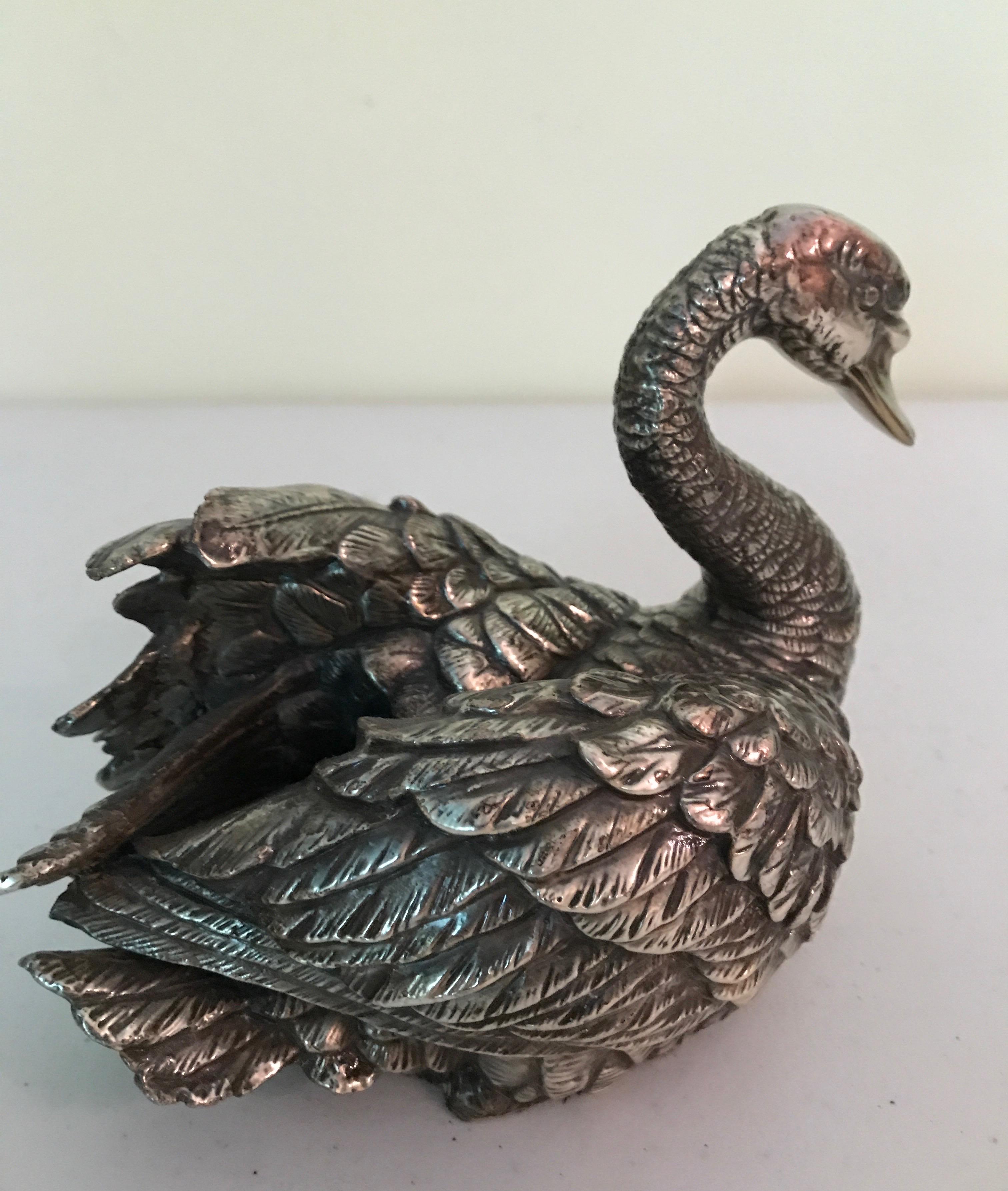 silver swan sculpture