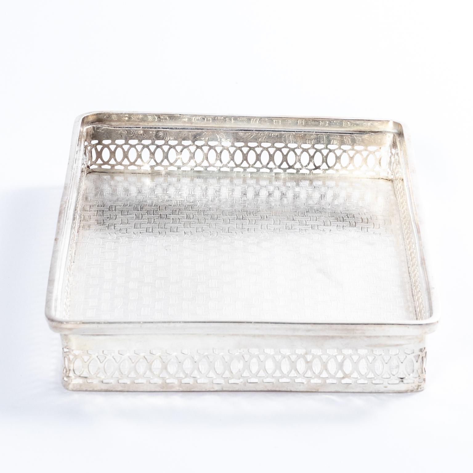 First class British Airways silver plated tray with a pierced gallery and basket weave detailing on the tray top, circa 1960s.
  