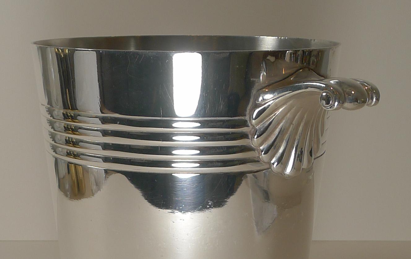 A handsome Art Deco Champagne bucket or wine cooler, made by quality silversmith's, Wiskemann of Brussels c.1930's.

A heavy, quality piece just back from our silversmith's workshop where it has been professionally cleaned and polished, restoring