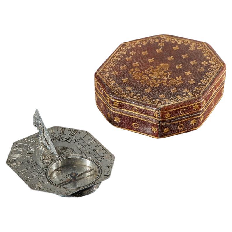 Shipping policy
No additional costs will be added to this order.
Shipping costs will be totally covered by the seller (customs duties included). 

Silver pocket sundial. The instrument features the latitudes of 24 European cities on the back. Bird