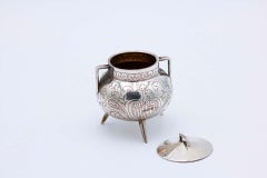 Silver pot shaped like an iron pot