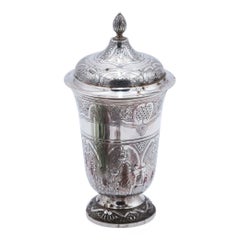 Silver pot with engraved floral motifs