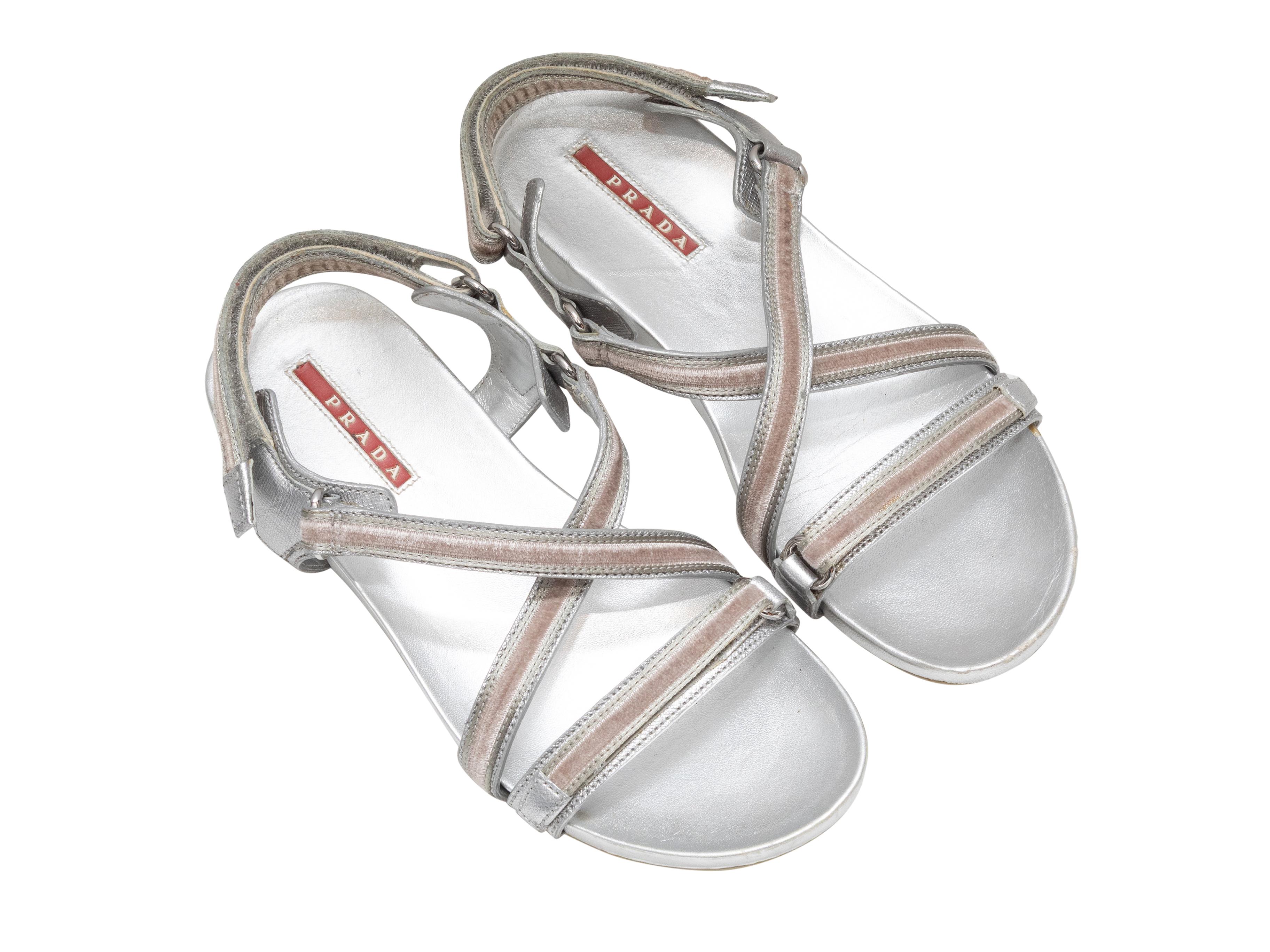 Silver leather and velvet strappy flat sandals by Prada. Velcro strap closures. 0.75