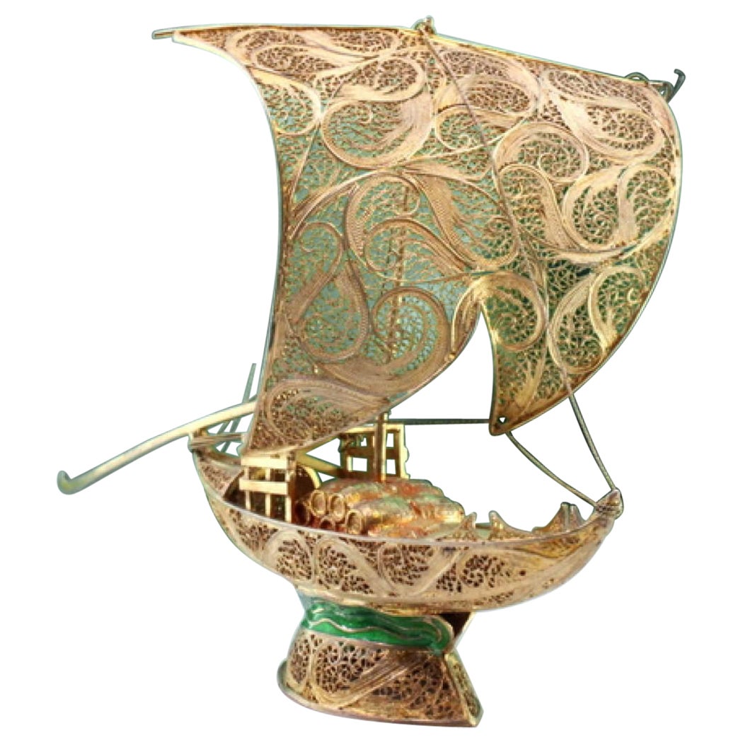 Silver Rabelo boat w/ gilded filigree, barrels
green enamel