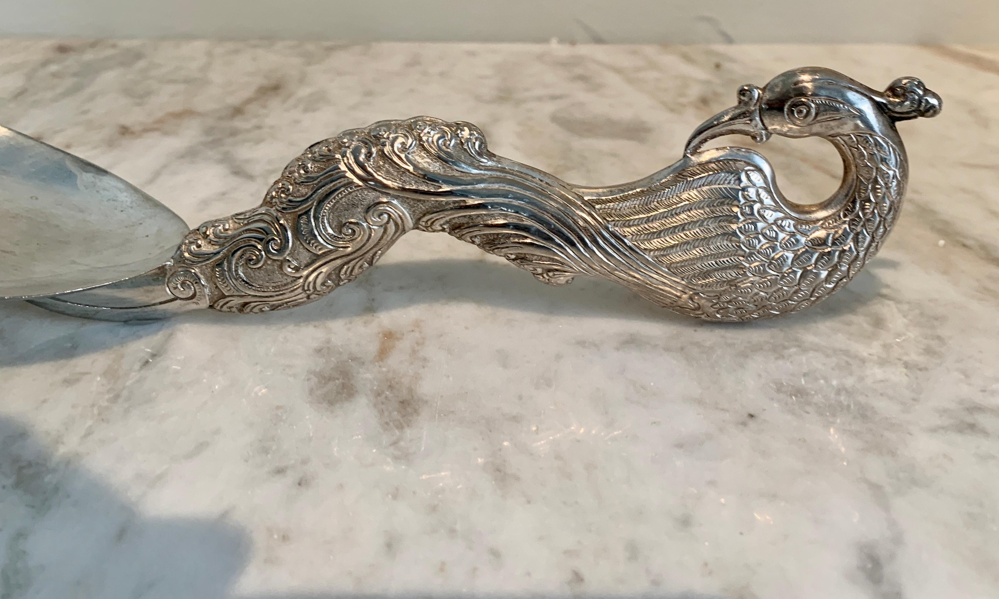 20th Century Silver Repoussé Serving Spoon with Peacock For Sale