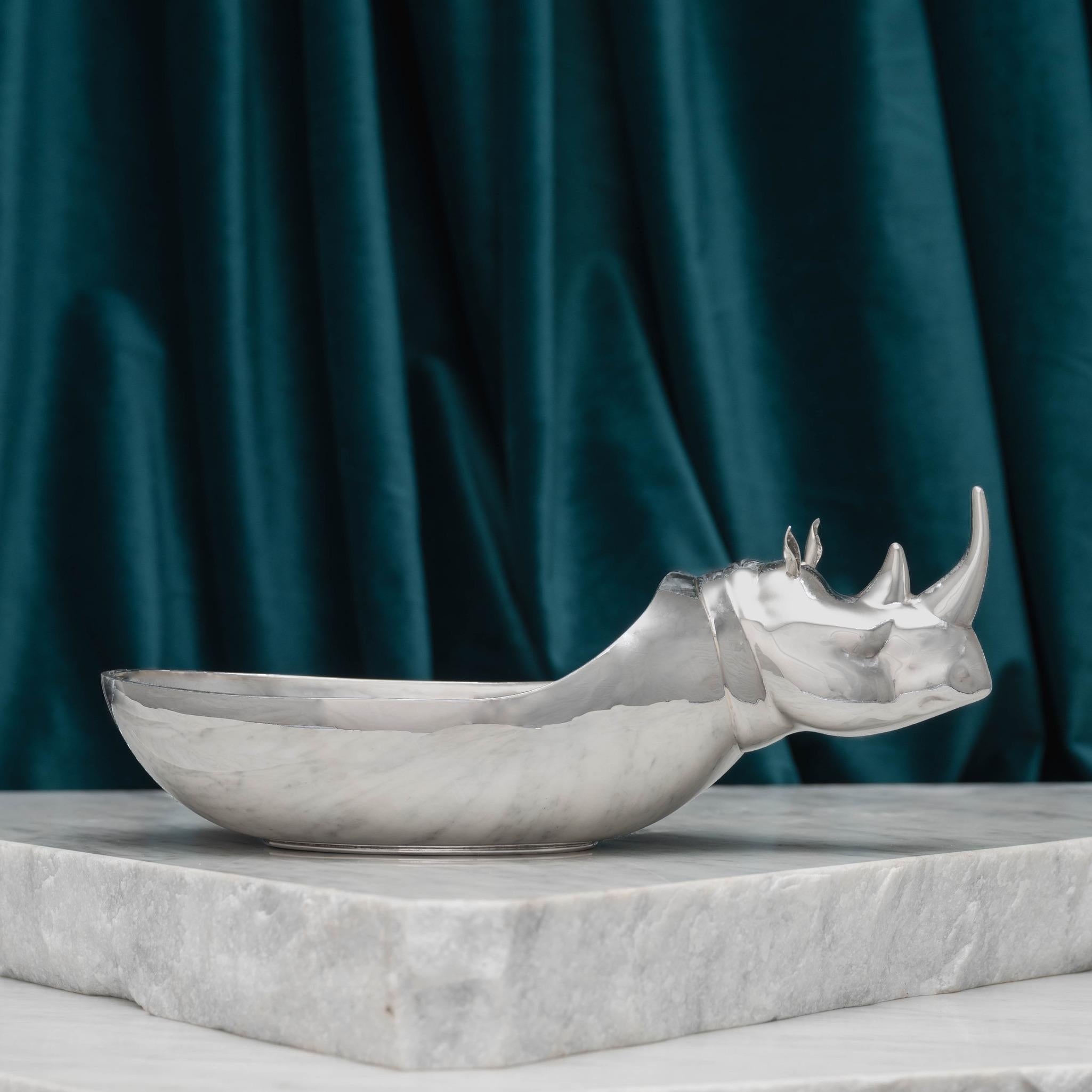 A wonderful Italian silver bowl modelled as a Rhino. Marked with a 925 purity stamp (the same as sterling silver), makers number & province mark, 665 MI dating it post 1970 and the maker’s mark for De Vecchi of Milan.

Piero de Vecchi opened his