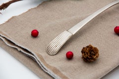 Silver rice and serving spoon with a fluted handle in the style of caninhas